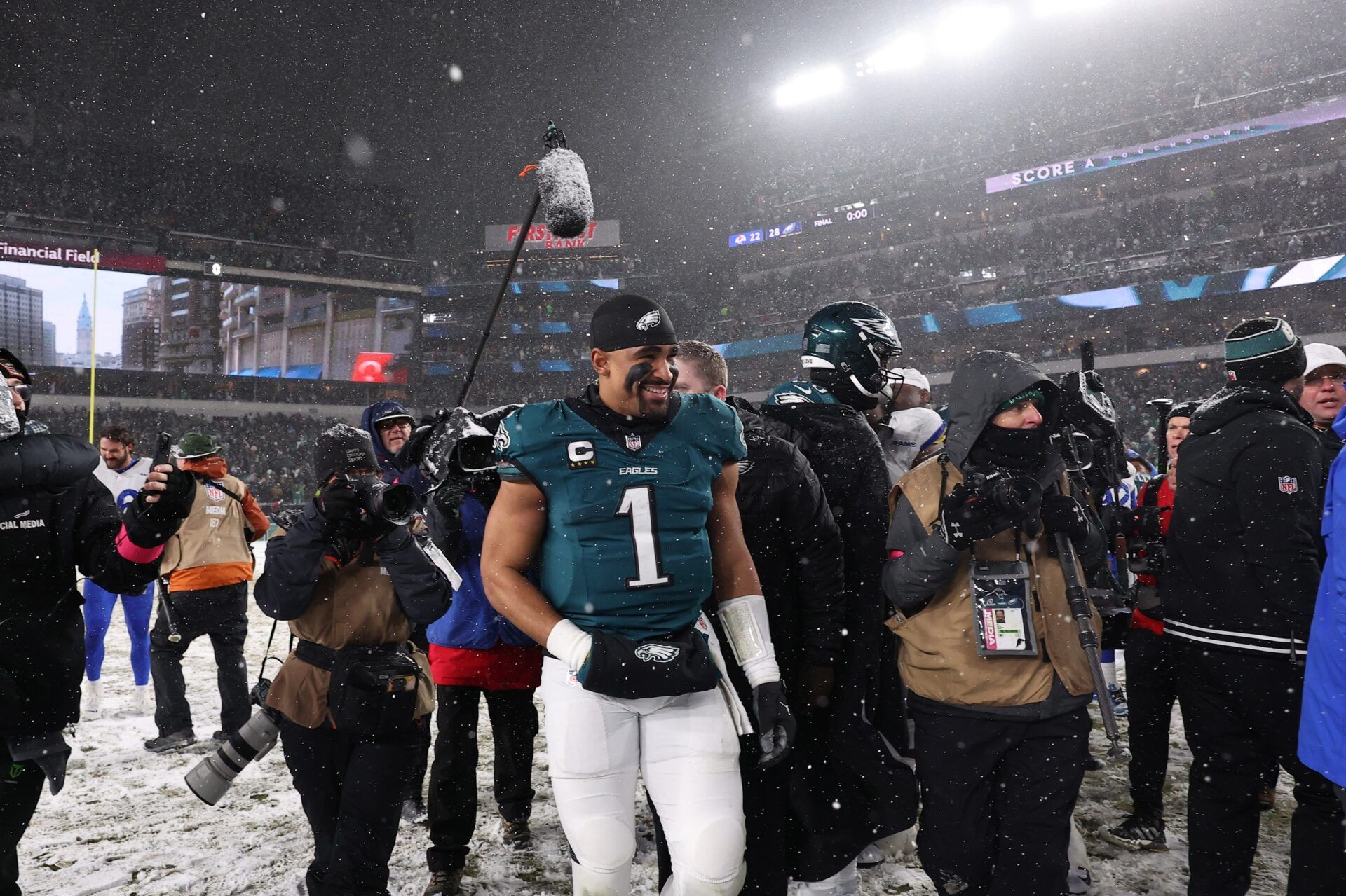 Philadelphia Eagles quarterback Jalen Hurts (1) walks off the field after defeating the Los Angeles Rams in a 2025 NFC divisional round game at Lincoln Financial Field.