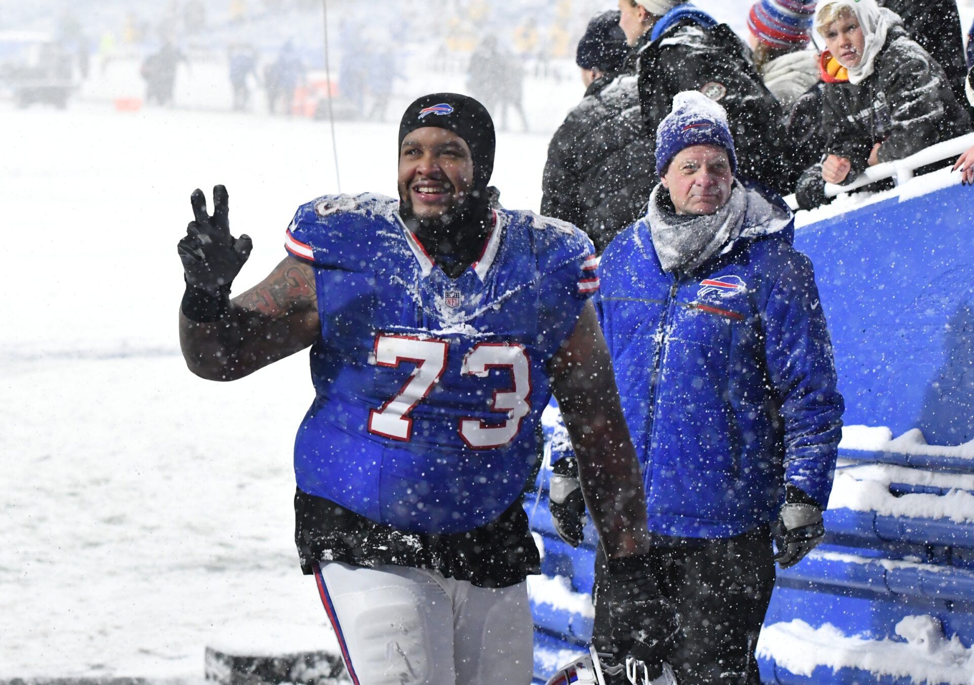 Buffalo Bills offensive tackle Dion Dawkins (73) leaves the field after winning a game against the San Francisco 49ers to clinch the AFC East title at Highmark Stadium.