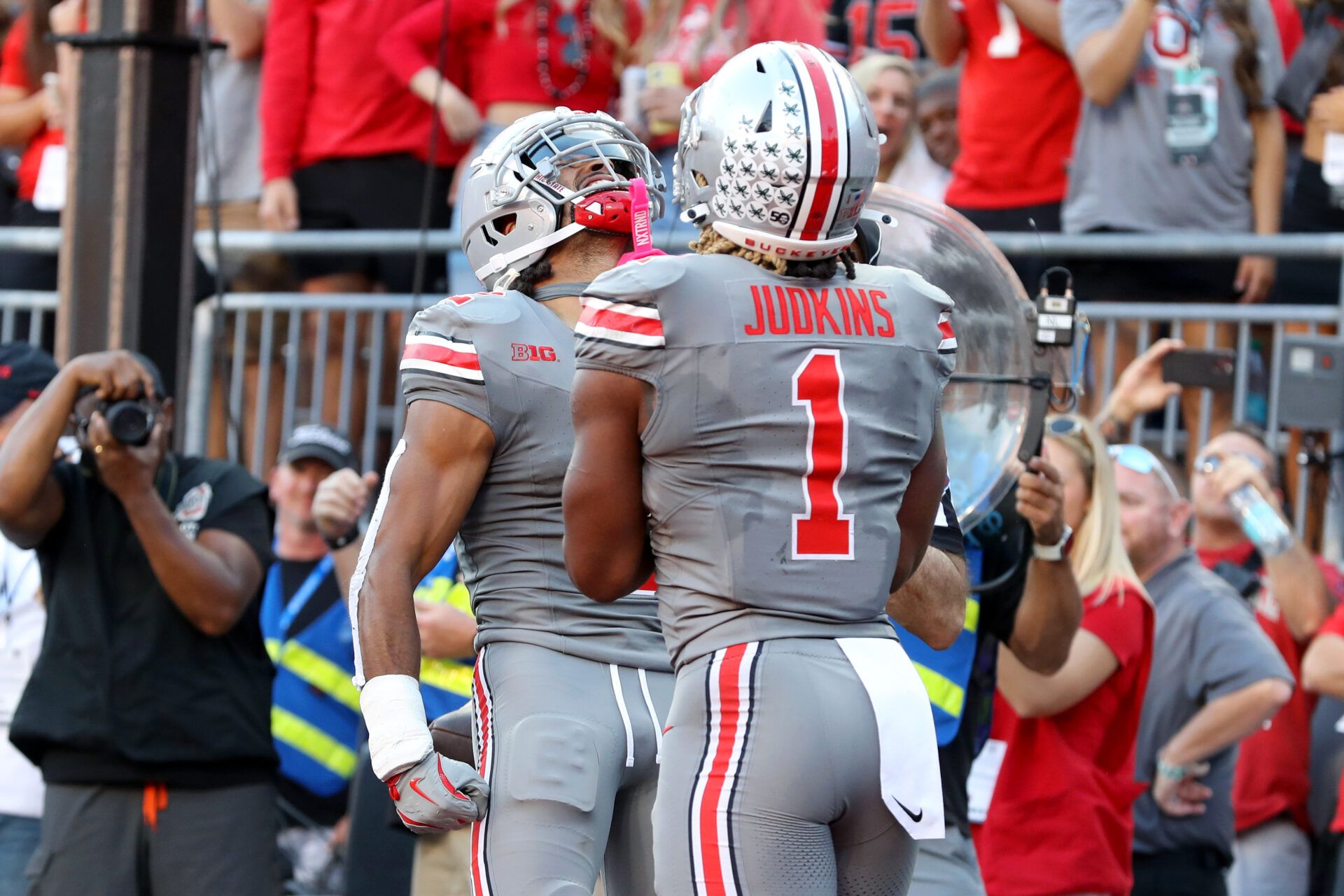 Oct 5, 2024; Columbus, Ohio, USA; Ohio State Buckeyes wide receiver Emeka Egbuka (2) celebrates with running back Quinshon Judkins (1) after scoring a touchdown against the Iowa Hawkeyes during the third quarter at Ohio Stadium. Mandatory Credit: Joseph Maiorana-Imagn Images