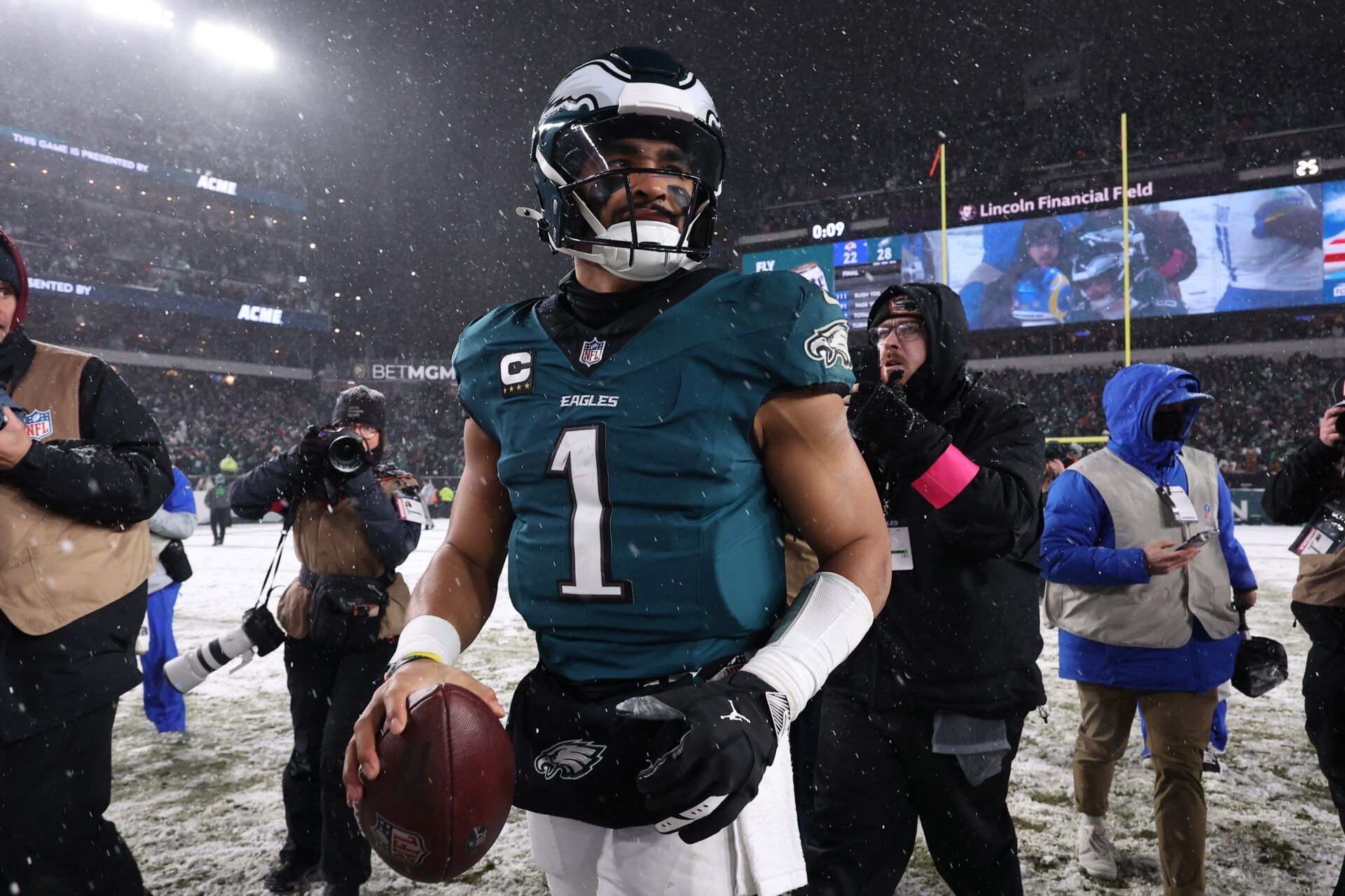 Philadelphia Eagles quarterback Jalen Hurts (1) looks on from the field after defeating the Los Angeles Rams in a 2025 NFC divisional round game at Lincoln Financial Field.