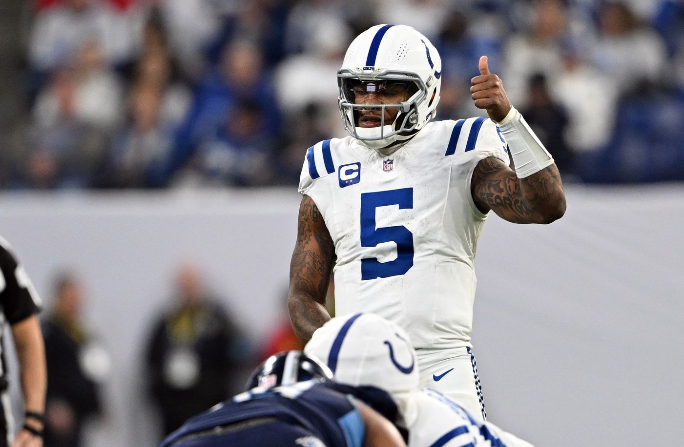 Indianapolis Colts quarterback Anthony Richardson (5) gives a thumbs up before the snap during the second half against the Tennessee Titans at Lucas Oil Stadium.