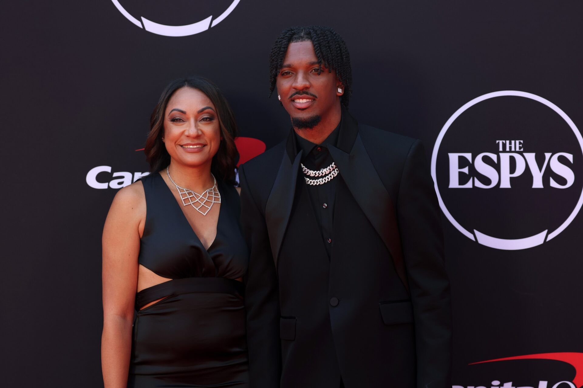 Washington Commanders quarterback Jayden Daniels and his mother Regina Jackson arrive on the red carpet before the 2024 ESPYS at Dolby Theatre.