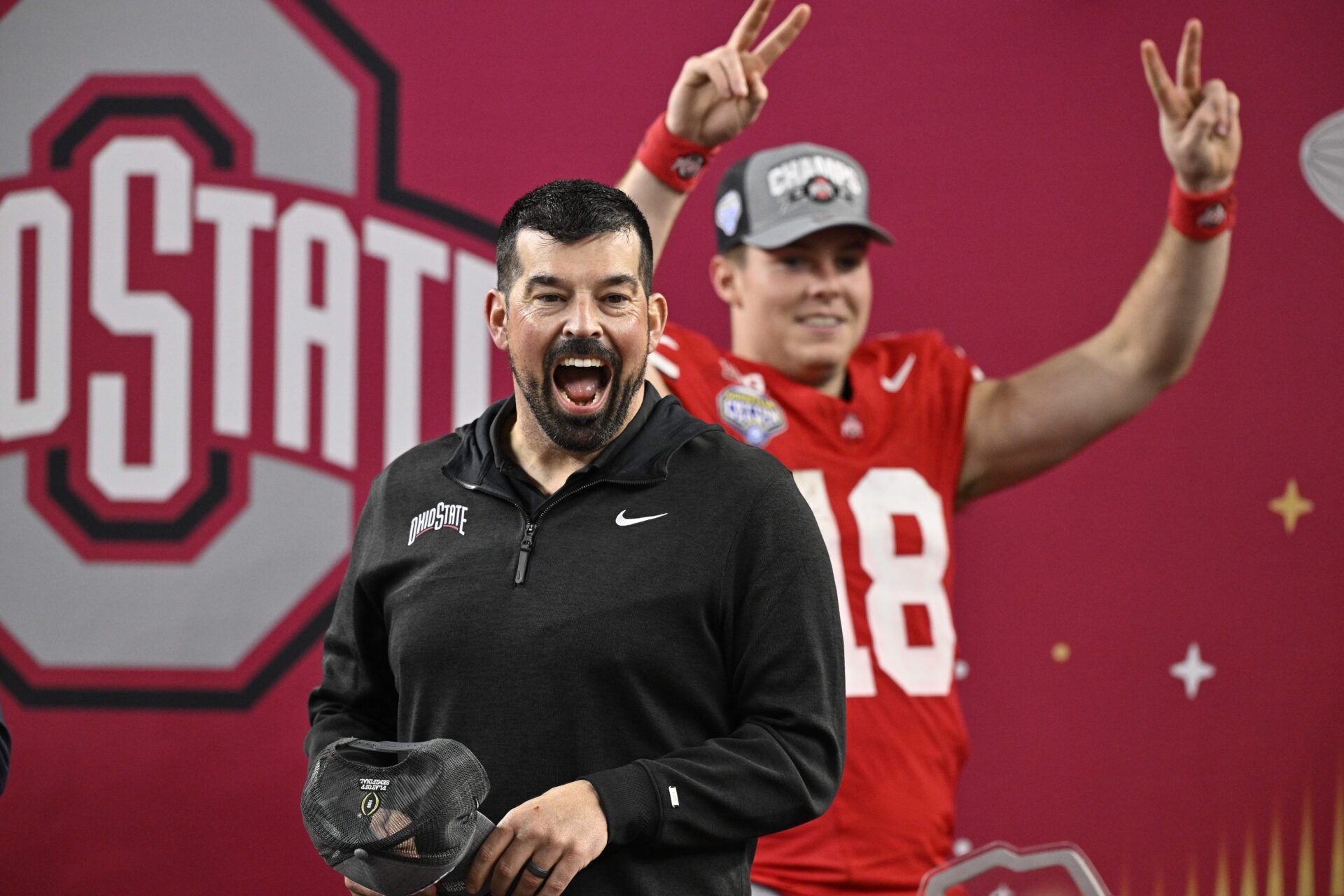 Ohio State Buckeyes head coach Ryan Day celebrates with quarterback Will Howard (18) after winning the College Football Playoff semifinal against the Texas Longhorns in the Cotton Bowl at AT&T Stadium.