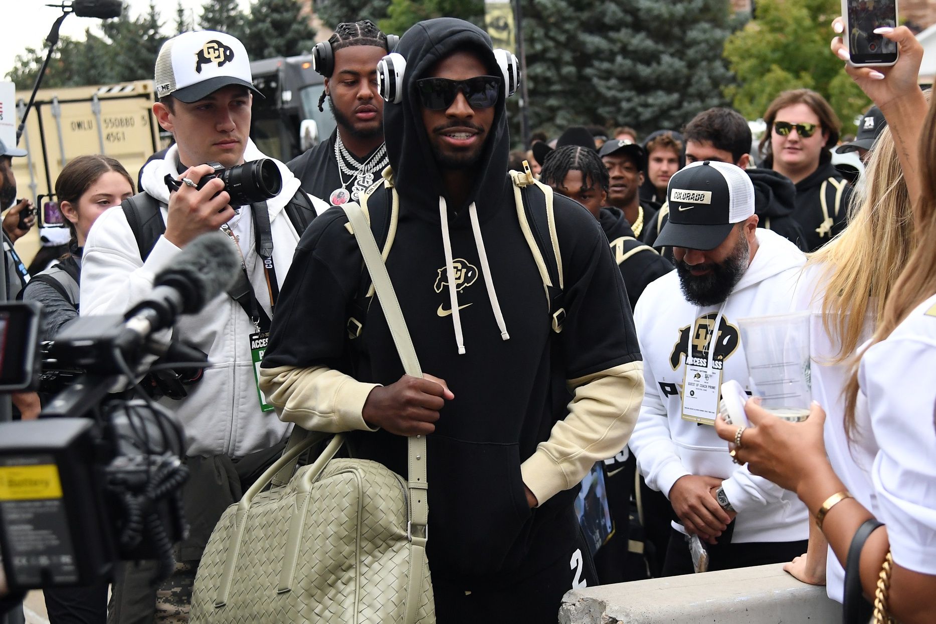 Colorado Buffaloes quarterback Shedeur Sanders (2) walks through Buff Walk before the game against the Baylor Bears at Folsom Field.