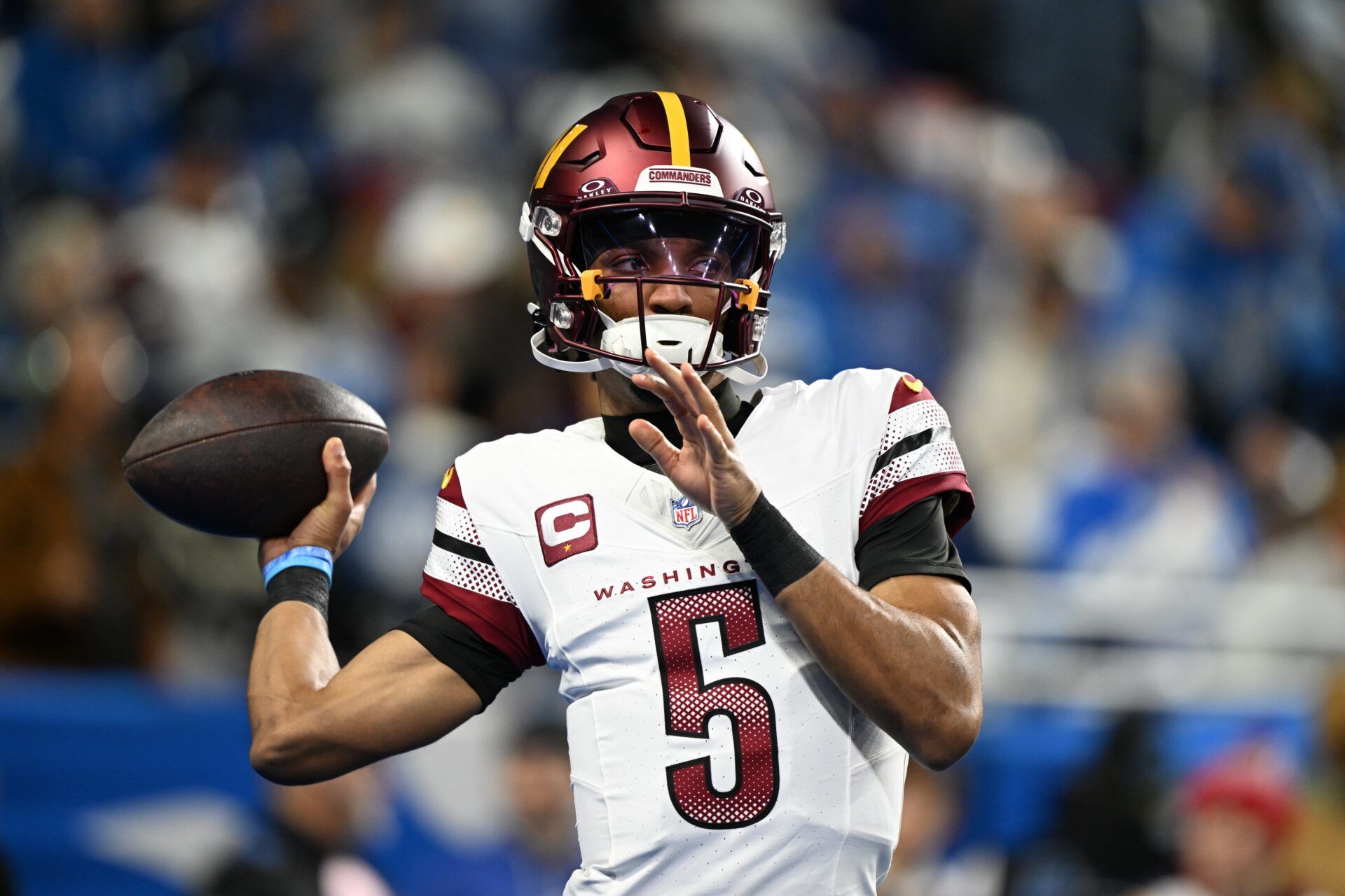 Washington Commanders quarterback Jayden Daniels (5) warms up prior to the game against Detroit Lions in a 2025 NFC divisional round game at Ford Field.