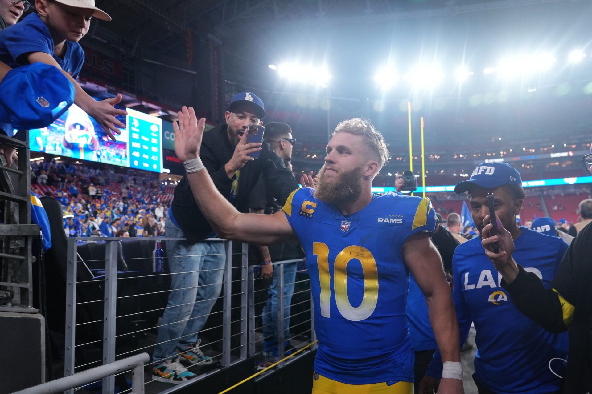 Los Angeles Rams wide receiver Cooper Kupp (10) reacts after the NFC wild card game against the Minnesota Vikings at State Farm Stadium.