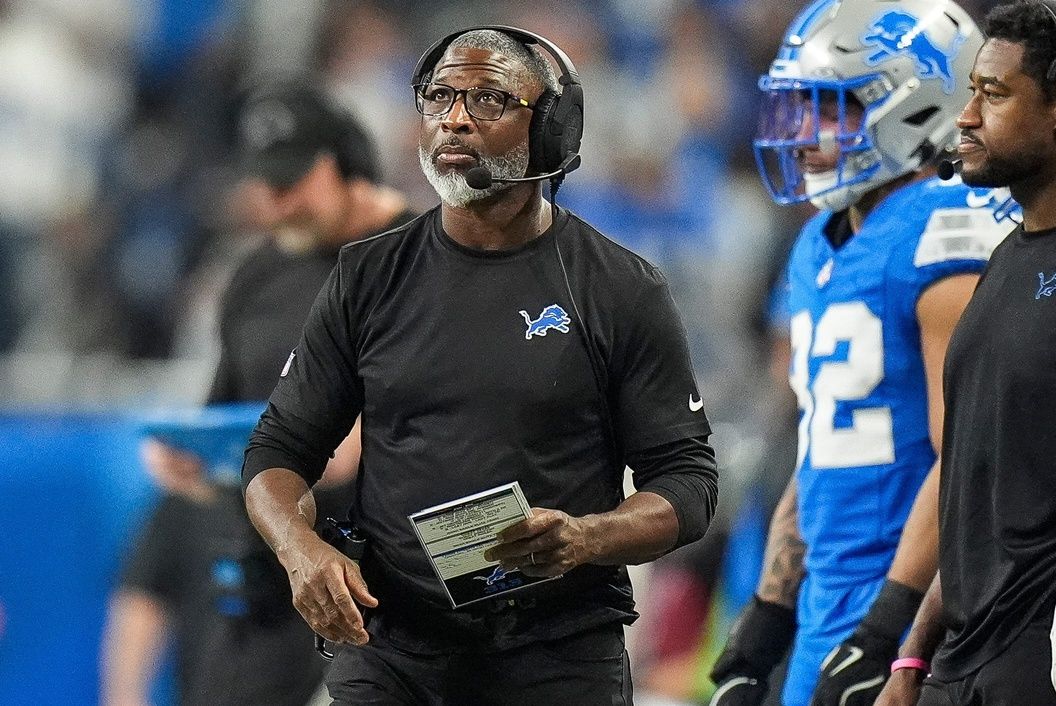 Detroit Lions defensive coordinator Aaron Glenn watches a replay during the first half of the 45-31 loss to the Washington Commanders in the NFC divisional round of the NFL playoffs at Ford Field in Detroit on Saturday, Jan. 18, 2025.