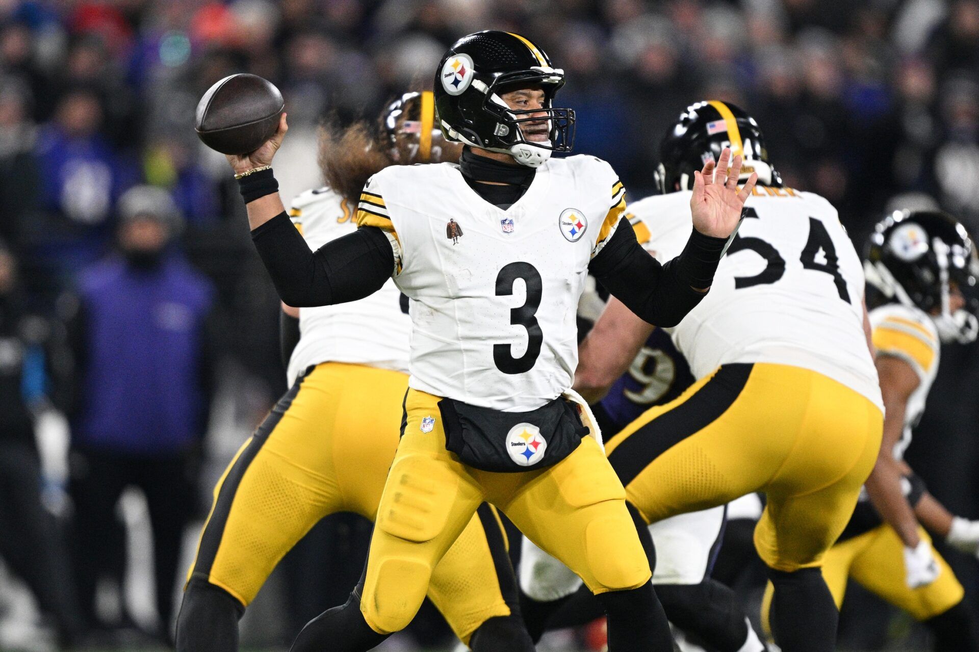 Pittsburgh Steelers quarterback Russell Wilson (3) passes in the second quarter against the Baltimore Ravens in an AFC wild card game at M&T Bank Stadium.