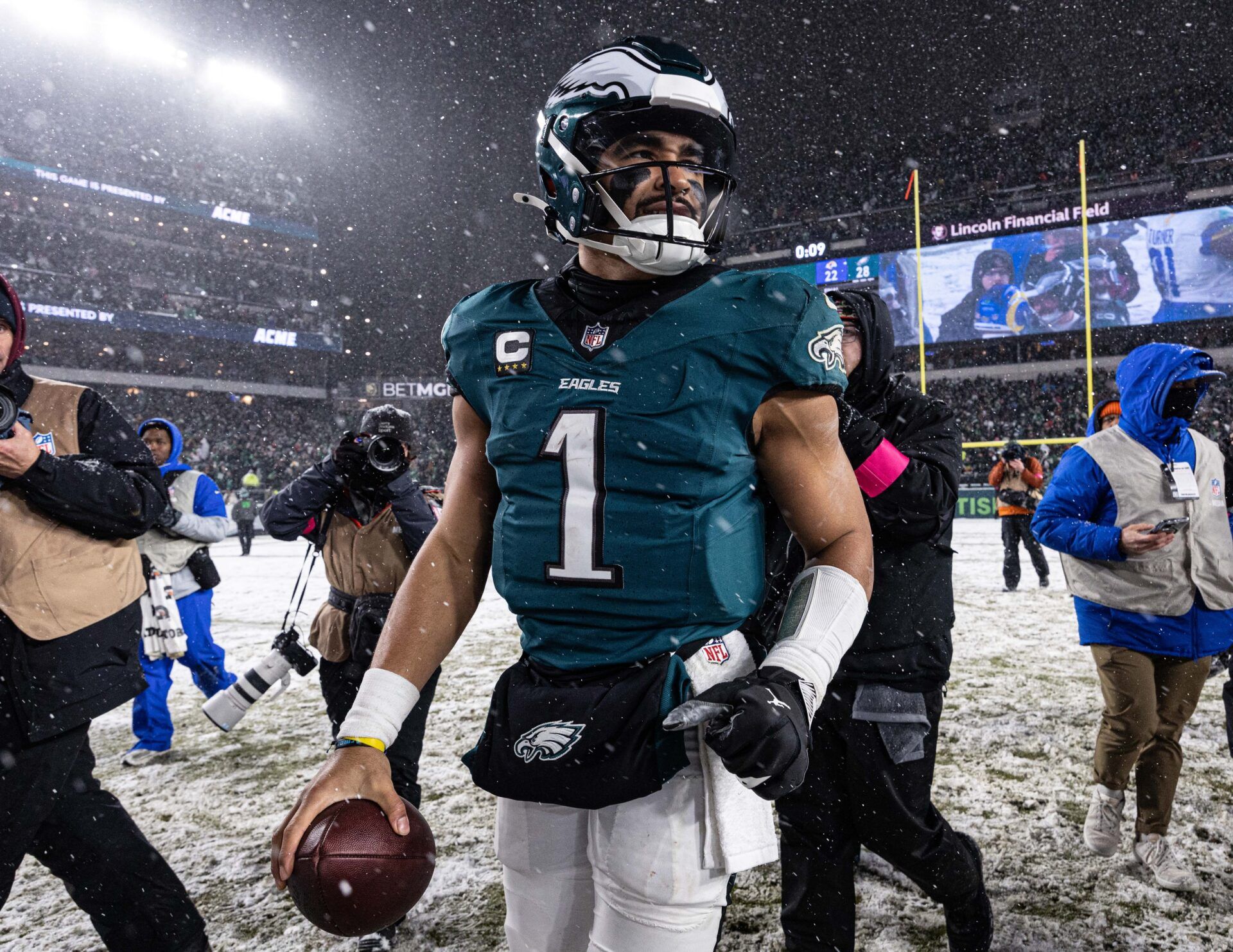 Philadelphia Eagles quarterback Jalen Hurts (1) walks the field after a victory against the Los Angeles Rams in a 2025 NFC divisional round game at Lincoln Financial Field.