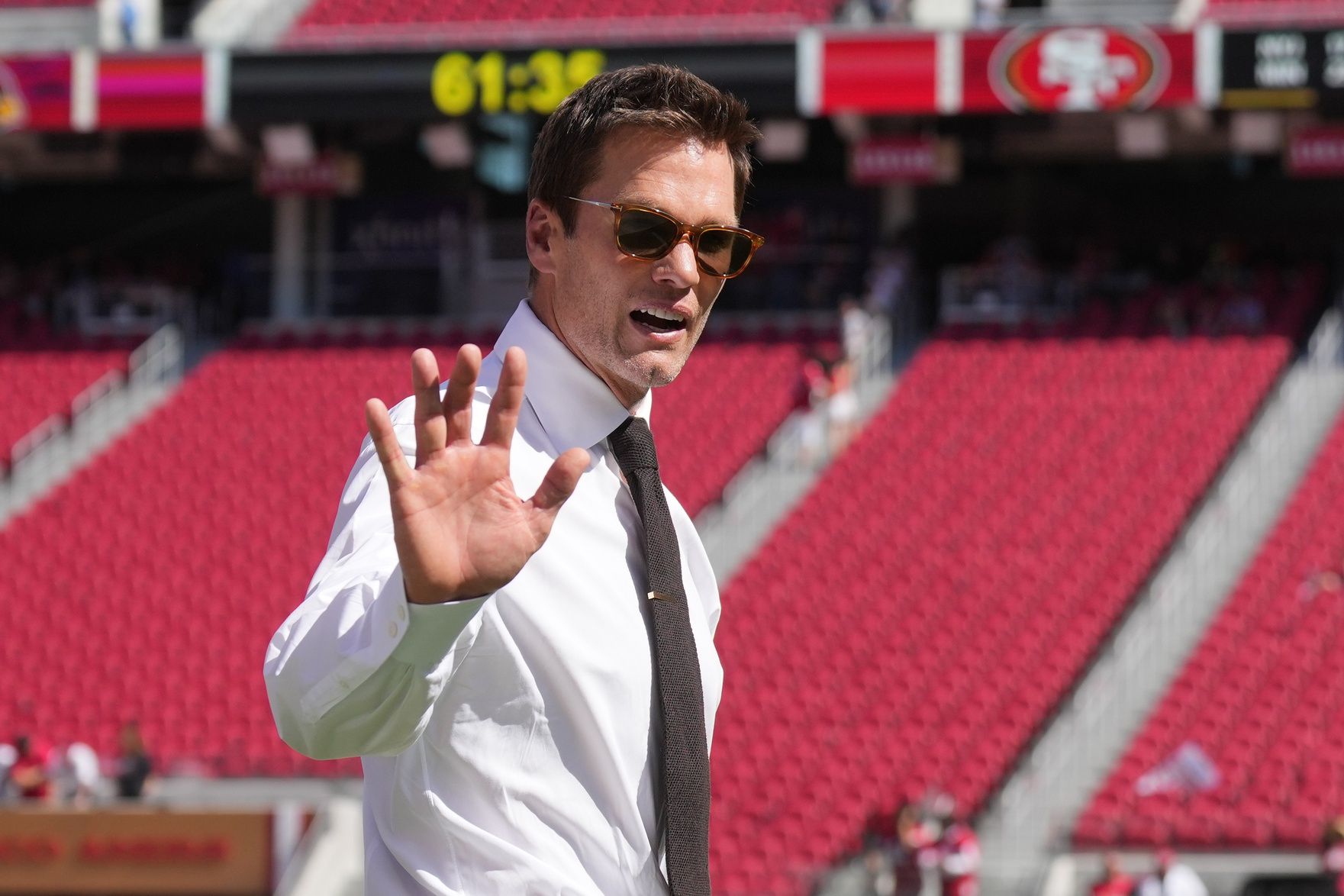 Fox color commentator Tom Brady gestures before the game between the San Francisco 49ers and the Arizona Cardinals at Levi's Stadium.