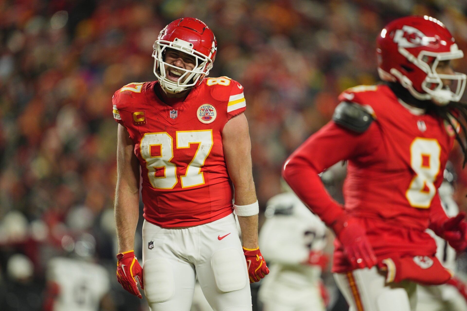 Kansas City Chiefs tight end Travis Kelce (87) reacts after a pass reception for a touchdown against the Houston Texans during the fourth quarter of a 2025 AFC divisional round game at GEHA Field at Arrowhead Stadium.