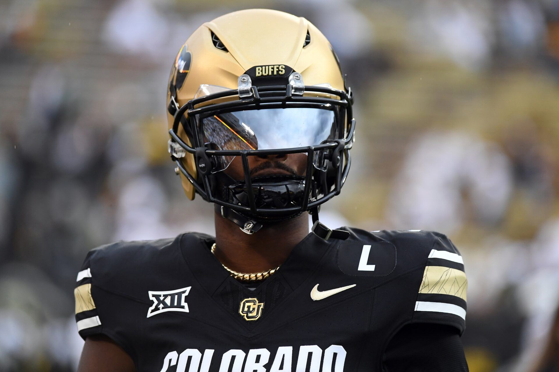 Colorado Buffaloes quarterback Shedeur Sanders (2) warms up before the game against the Baylor Bears at Folsom Field.