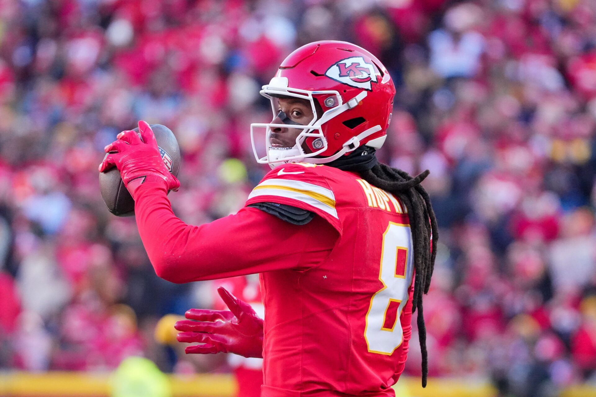 Kansas City Chiefs wide receiver DeAndre Hopkins (8) celebrates after catching a pass against the Houston Texans during the second half at GEHA Field at Arrowhead Stadium.