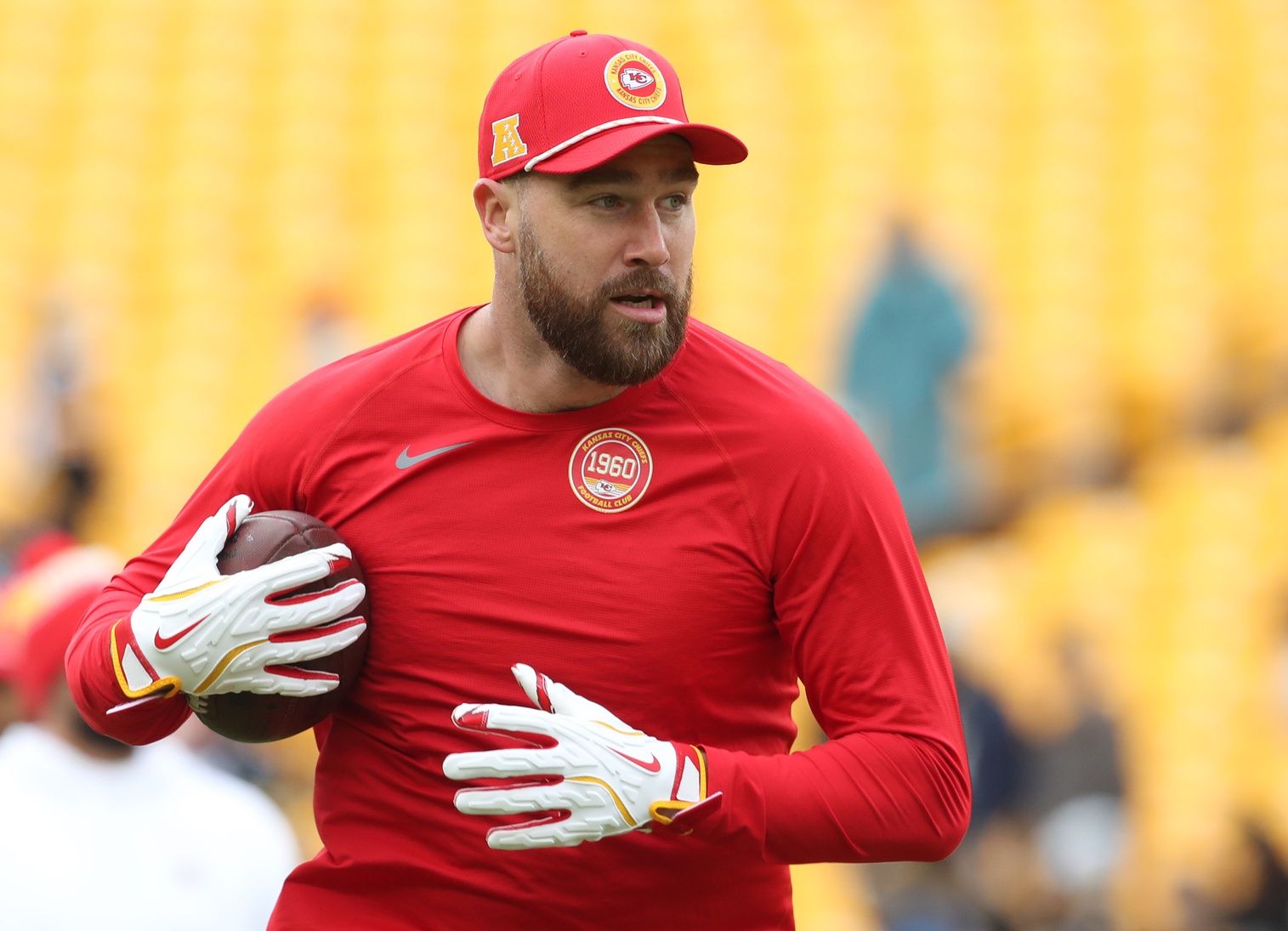 Kansas City Chiefs tight end Travis Kelce (87) warms up before the game against the Pittsburgh Steelers at Acrisure Stadium.