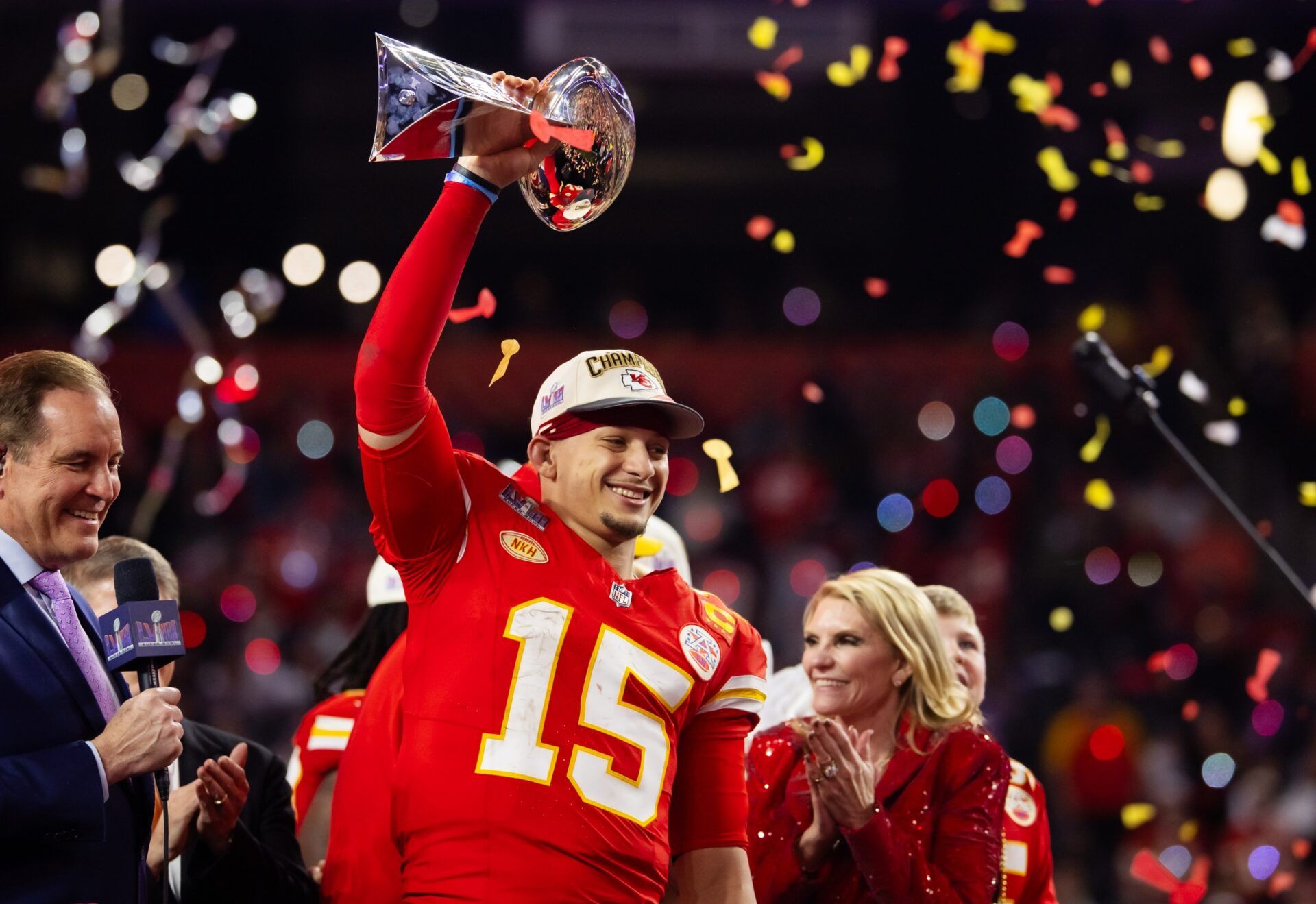 Kansas City Chiefs quarterback Patrick Mahomes (15) celebrates with the Vince Lombardi Trophy after defeating the San Francisco 49ers in overtime of Super Bowl LVIII at Allegiant Stadium.