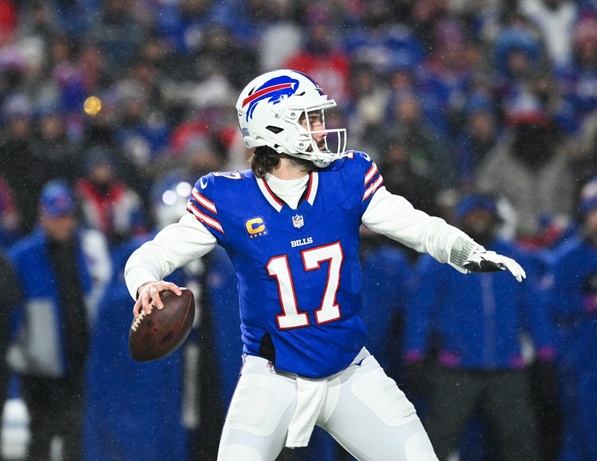 Buffalo Bills quarterback Josh Allen (17) looks to throw during the first quarter against the Baltimore Ravens in a 2025 AFC divisional round game at Highmark Stadium.