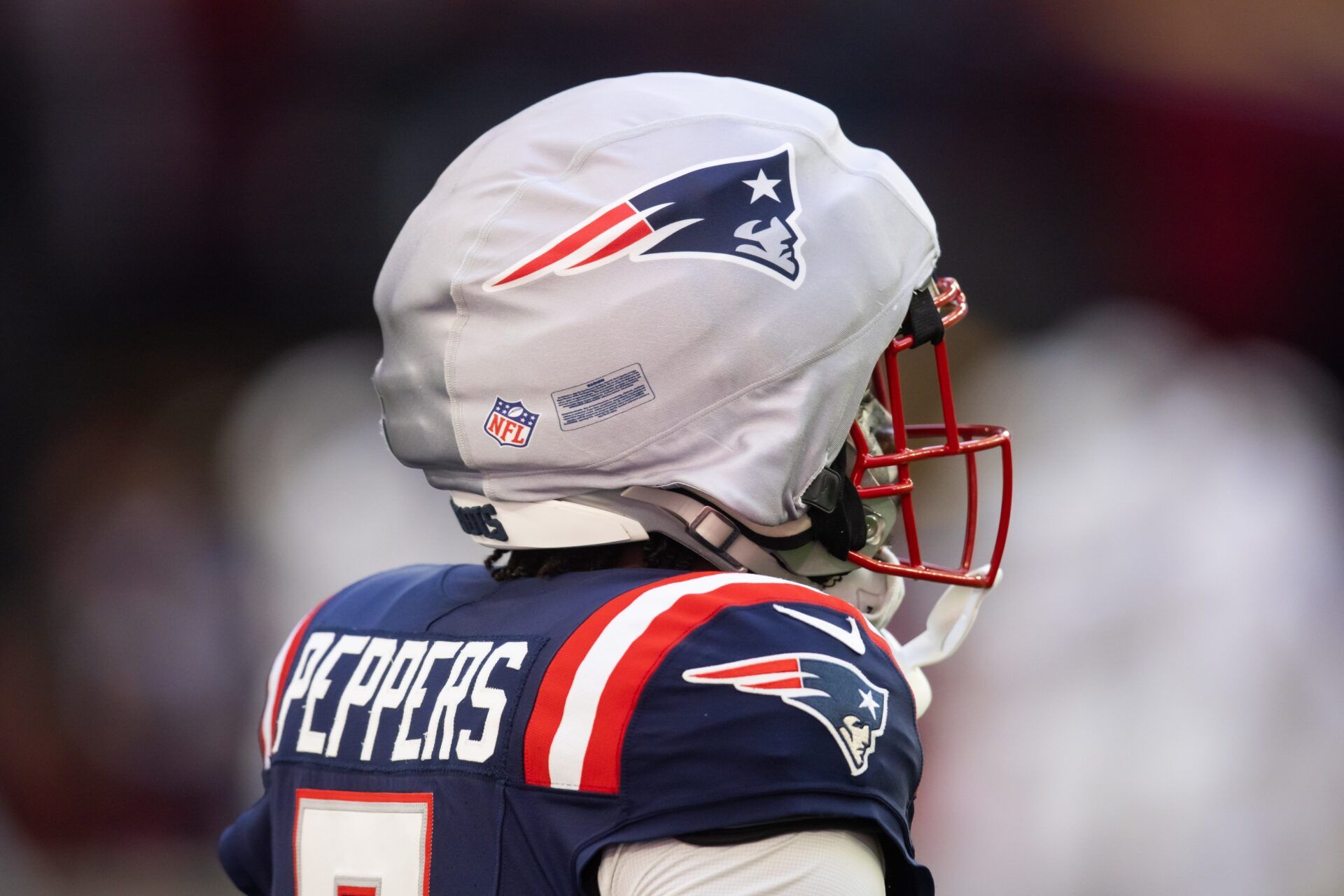 Detailed view of the guardian cap on the helmet of New England Patriots safety Jabrill Peppers (5) against the Arizona Cardinals at State Farm Stadium.