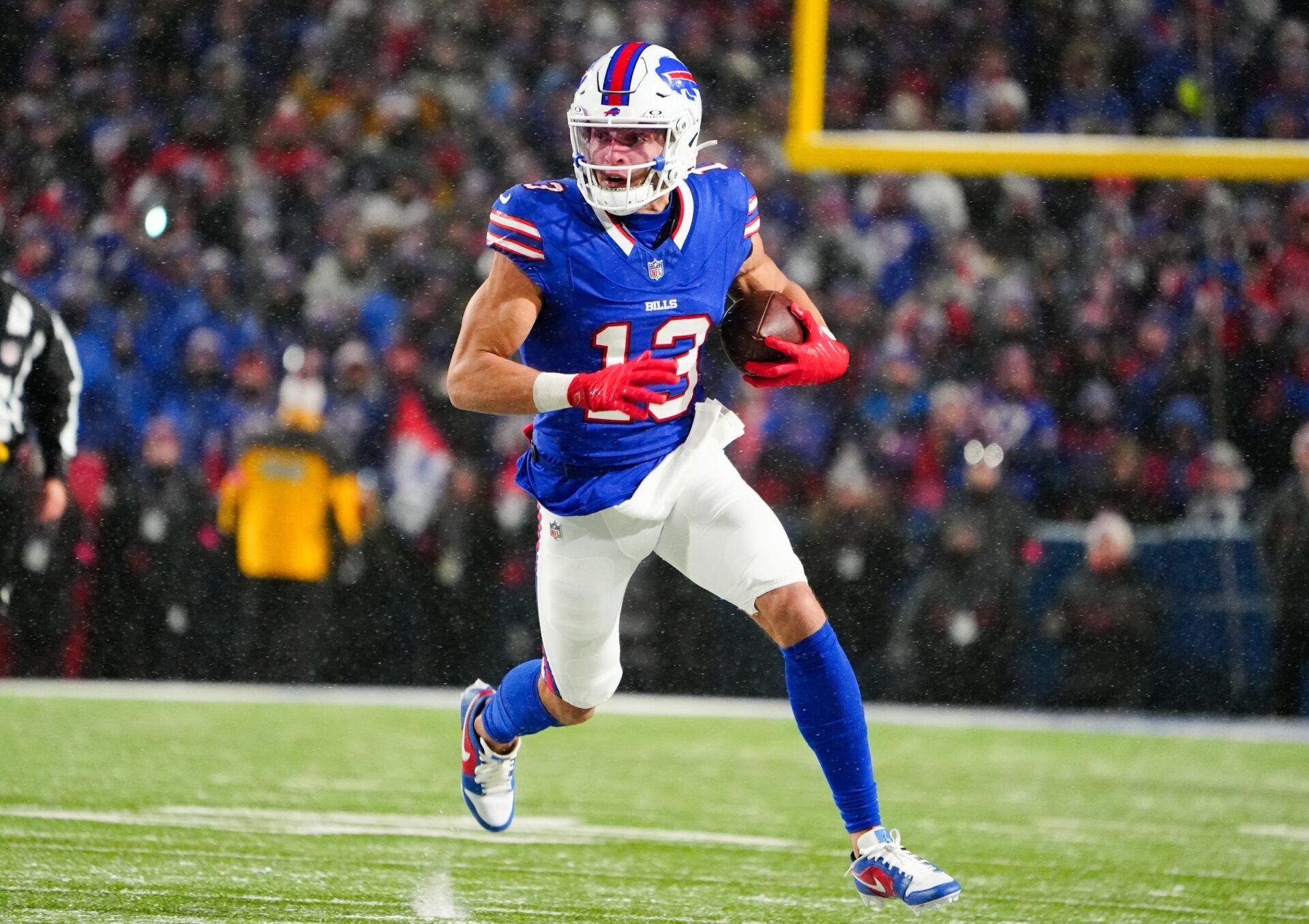 Buffalo Bills wide receiver Mack Hollins (13) runs the ball during the fourth quarter against the Baltimore Ravens in a 2025 AFC divisional round game at Highmark Stadium.