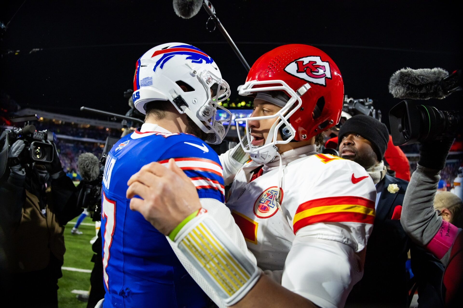 Kansas City Chiefs quarterback Patrick Mahomes (15) greets Buffalo Bills quarterback Josh Allen (17) following the 2024 AFC divisional round game at Highmark Stadium.