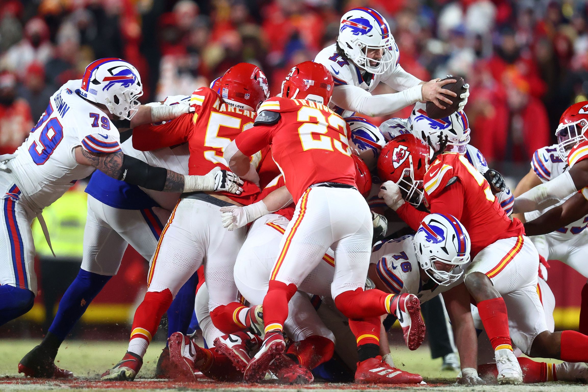 Buffalo Bills quarterback Josh Allen (17) dives for a first down against the Kansas City Chiefs during the second half in the AFC Championship game at GEHA Field at Arrowhead Stadium.