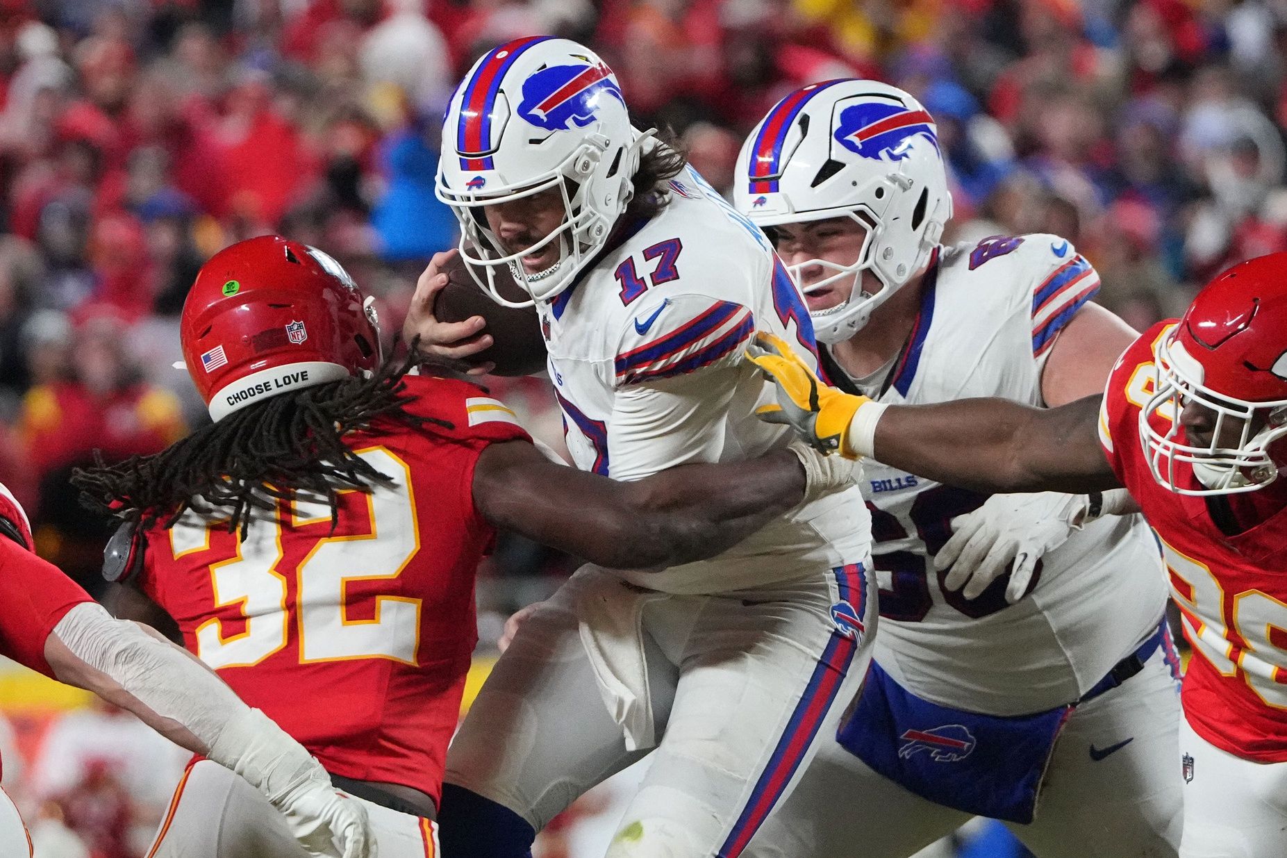 Buffalo Bills quarterback Josh Allen (17) rushes the ball against the Kansas City Chiefs during the second half in the AFC Championship game at GEHA Field at Arrowhead Stadium.