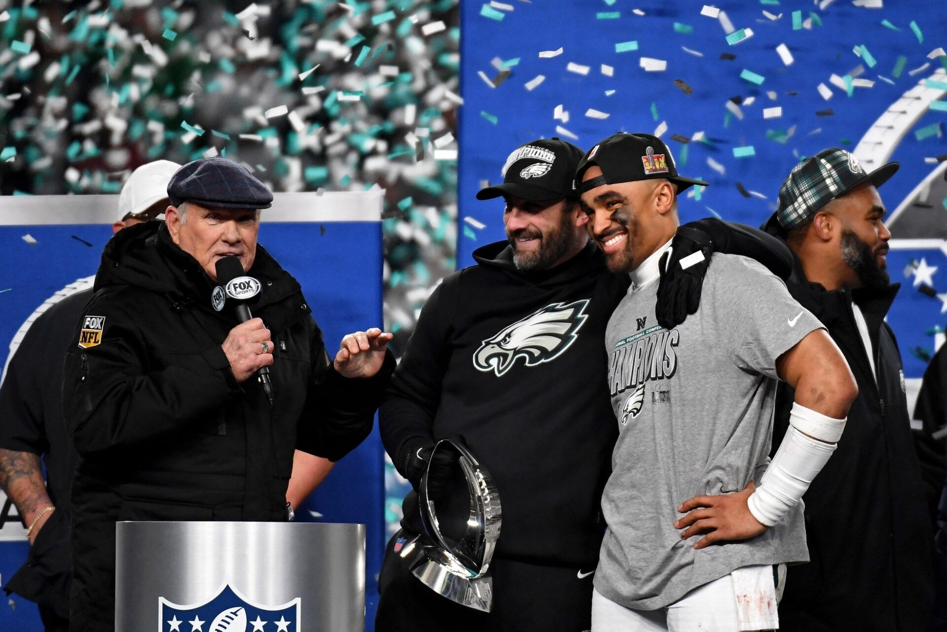 Terry Bradshaw interviews Philadelphia Eagles head coach Nick Sirianni and quarterback Jalen Hurts (1) after winning the NFC Championship game against the Washington Commanders at Lincoln Financial Field.