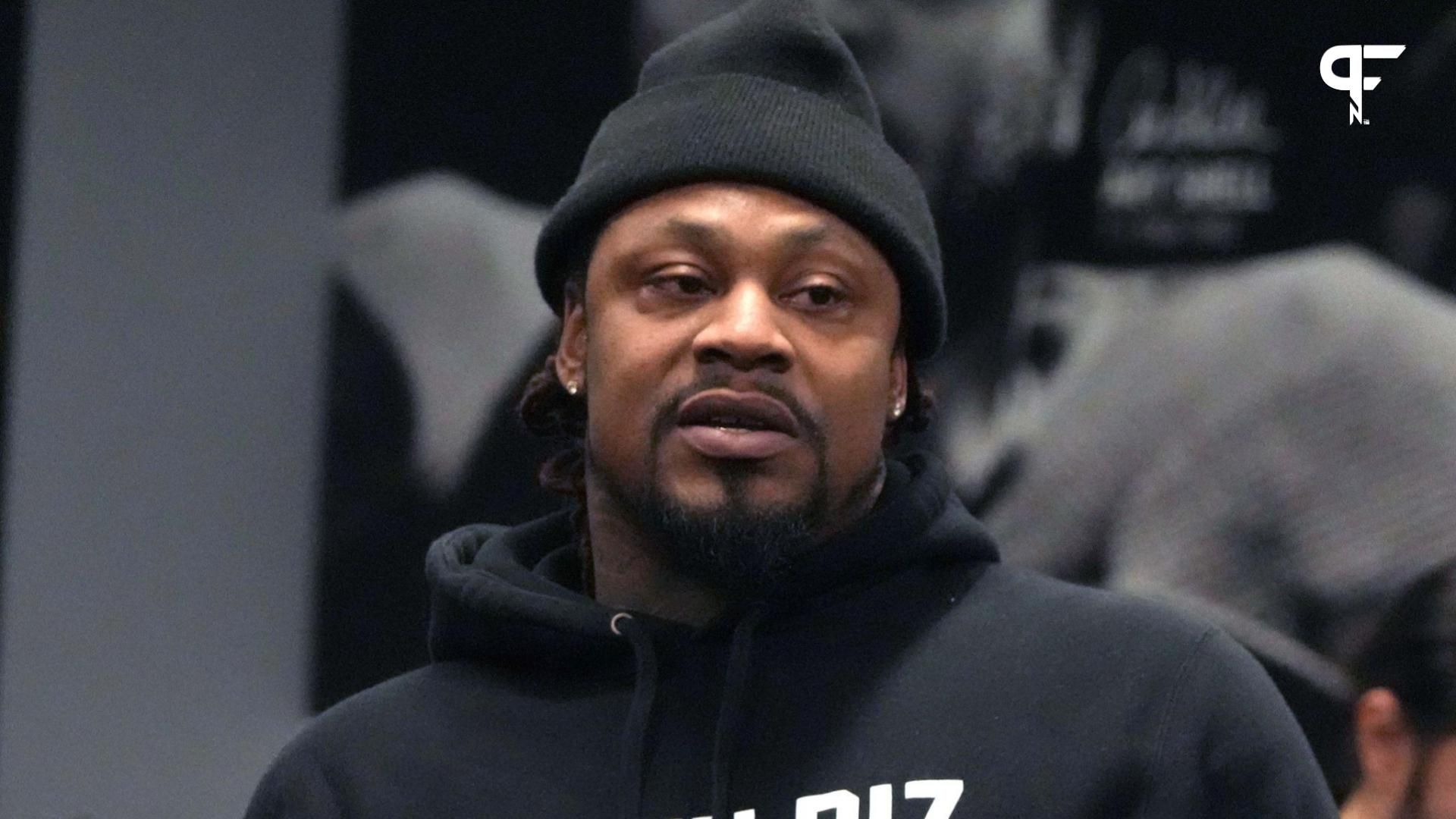 Marshawn Lynch crashed Pete Carroll’s press conference with a legendary moment, sparking hype and stealing the show.