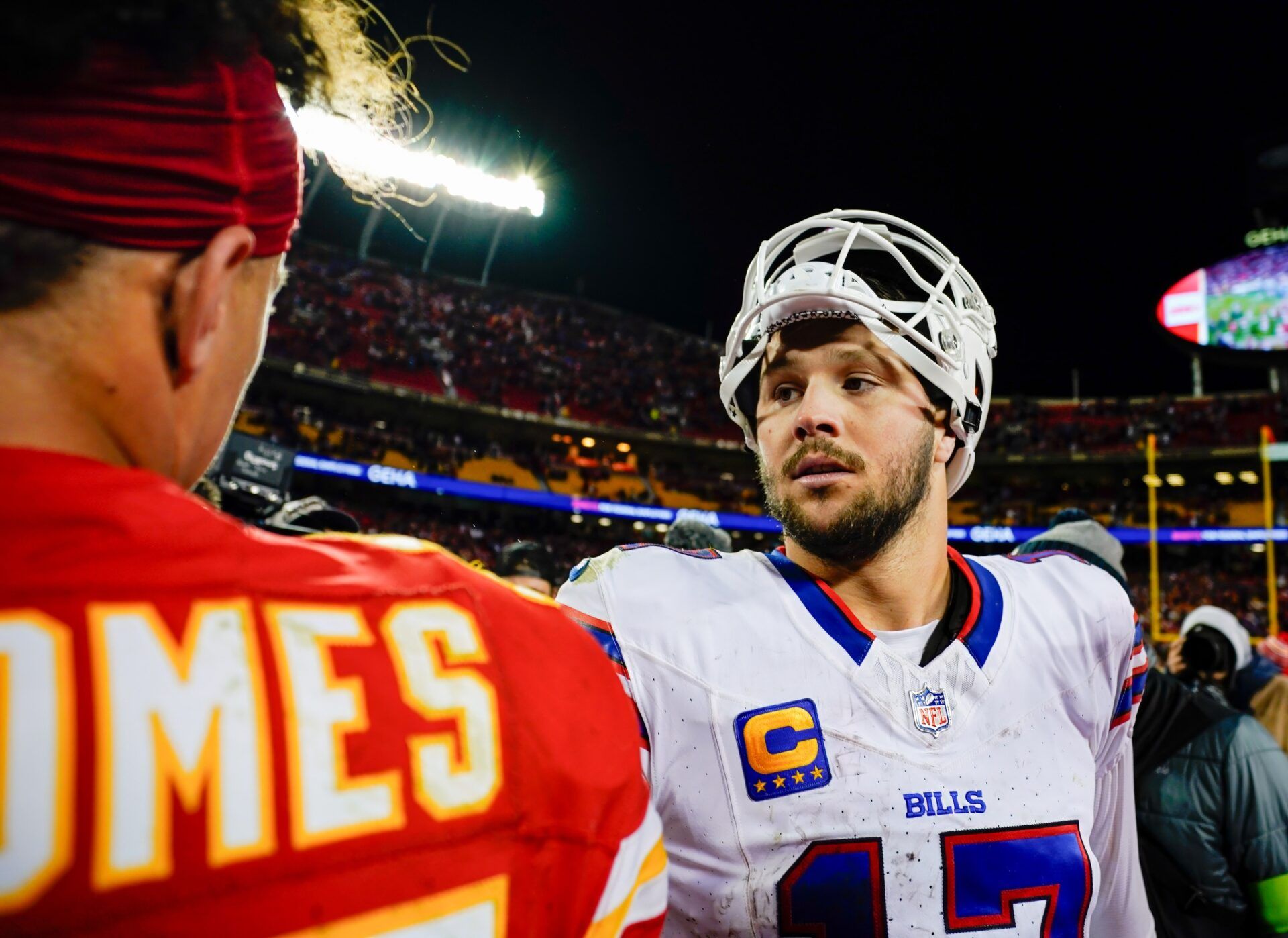 Buffalo Bills quarterback Josh Allen (17) talks with Kansas City Chiefs quarterback Patrick Mahomes (15) after a game at GEHA Field at Arrowhead Stadium.