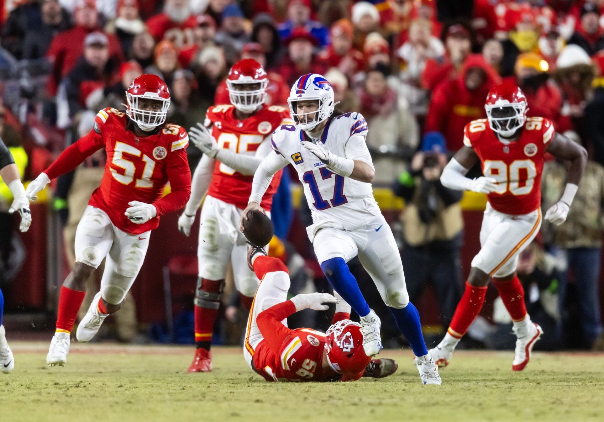 Buffalo Bills quarterback Josh Allen (17) runs the ball against the Kansas City Chiefs during the AFC Championship game at GEHA Field at Arrowhead Stadium.