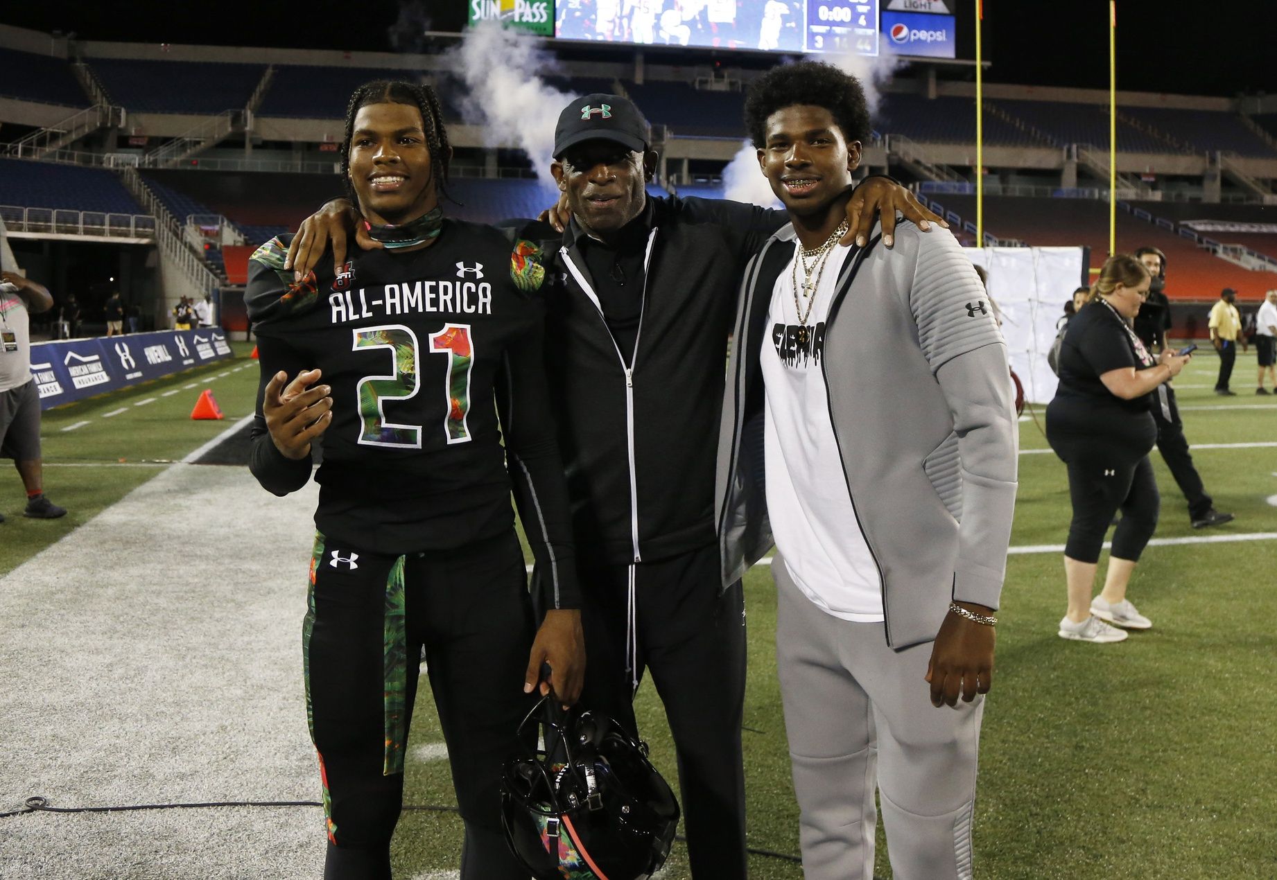 Team Ballaholics head coach Deion Sanders poses with his son defensive back Shilo Sanders (21) at Camping World Stadium.