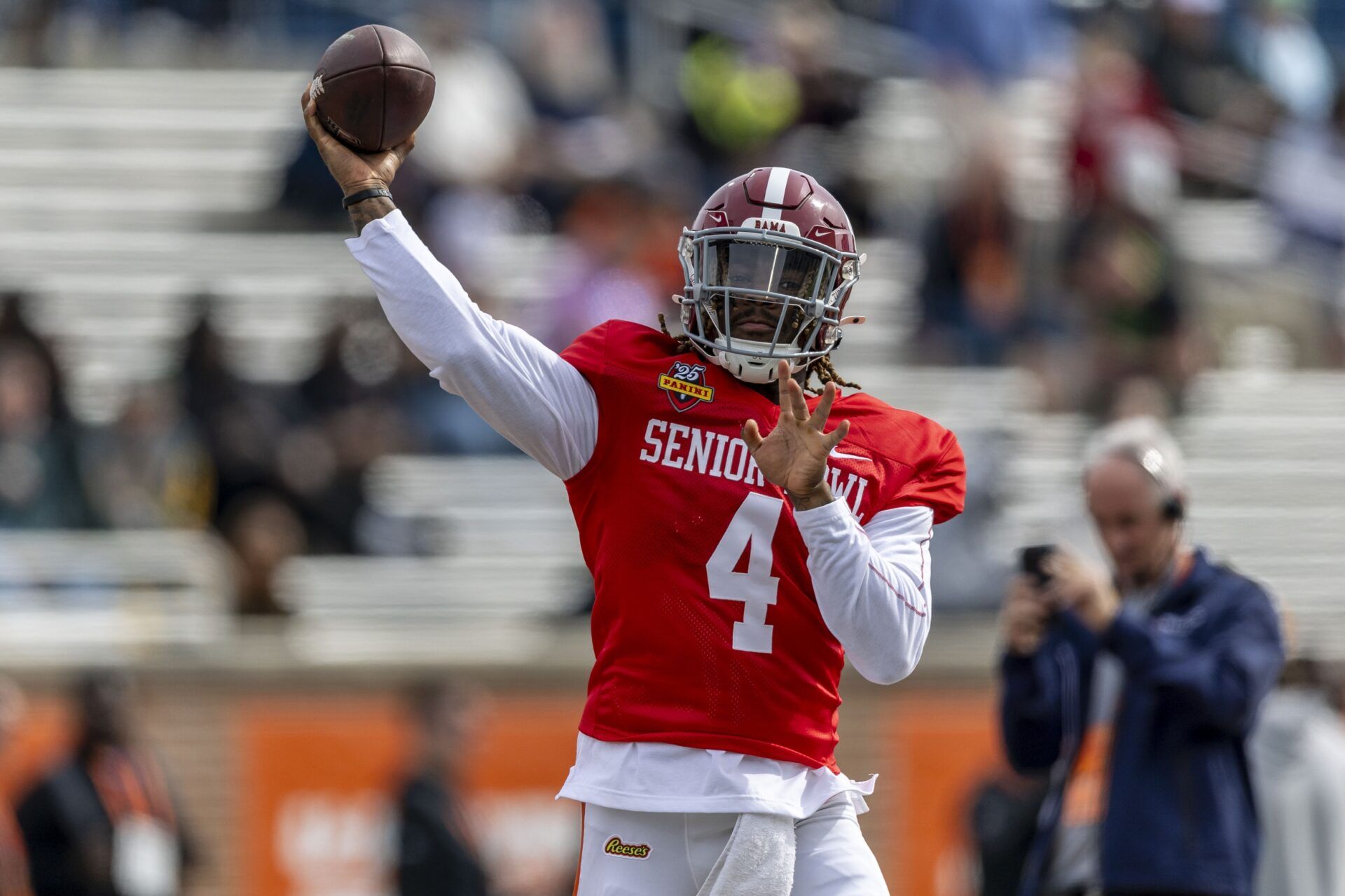 American team quarterback Jalen Milroe of Alabama (4) throws the ball during Senior Bowl practice for the American team at Hancock Whitney Stadium.