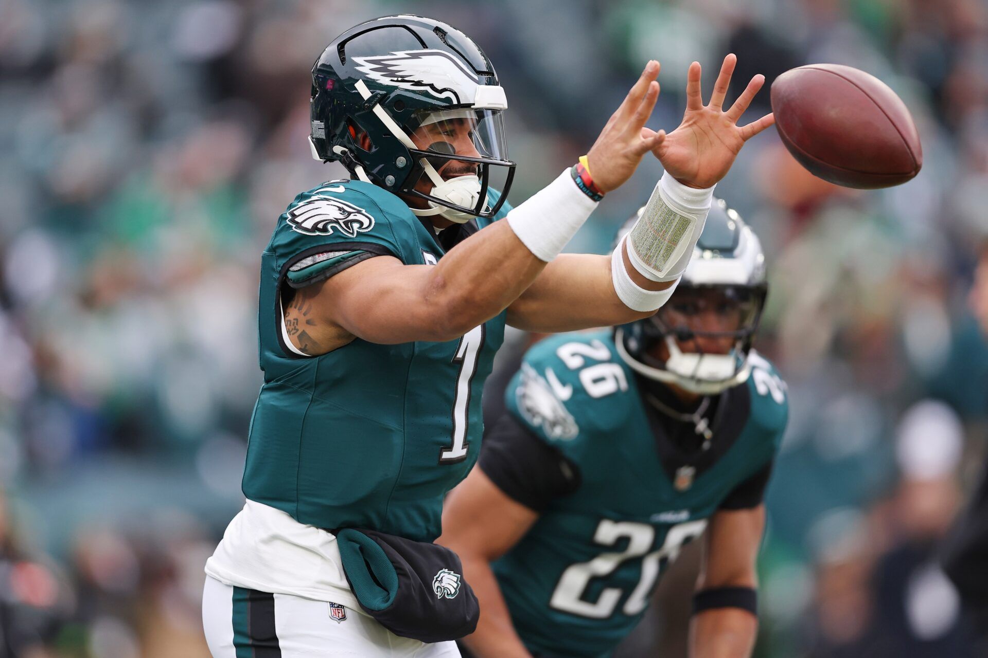 Philadelphia Eagles quarterback Jalen Hurts (1) warms up before the NFC Championship game at Lincoln Financial Field.