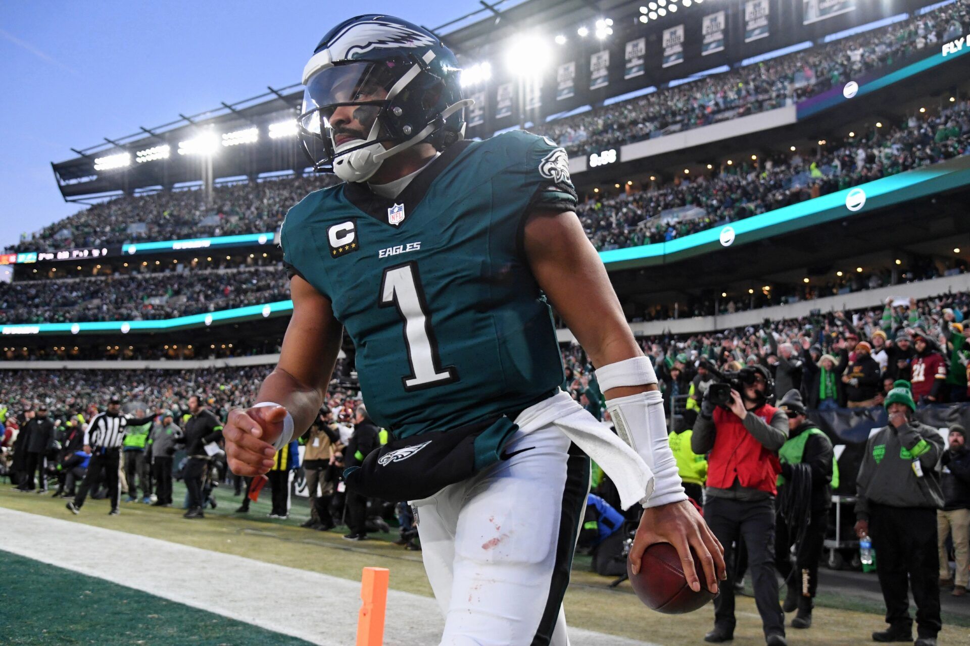 Philadelphia Eagles quarterback Jalen Hurts (1) reacts after a touchdown against the Washington Commanders during the second half in the NFC Championship game at Lincoln Financial Field.