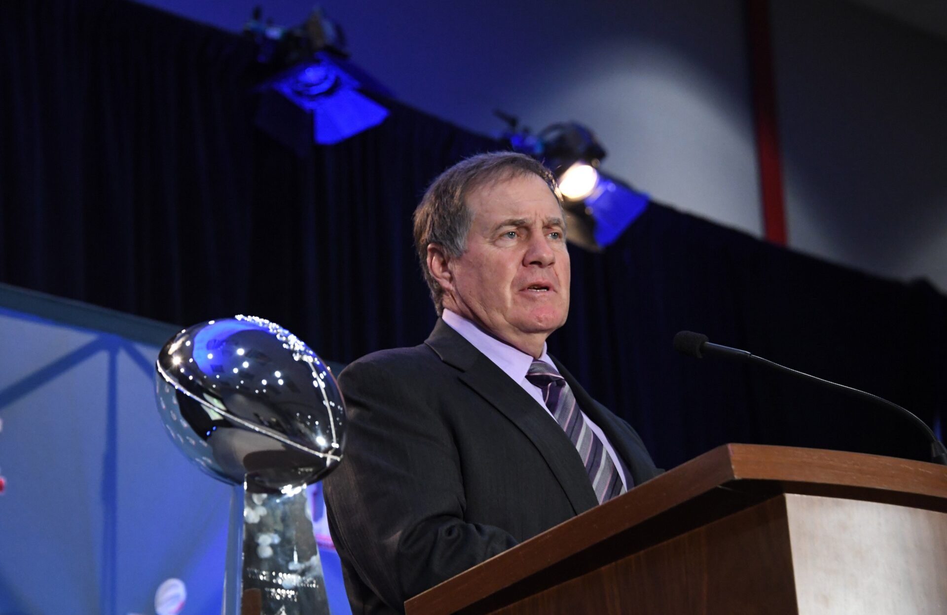 New England Patriots coach Bill Belichick speaks during the Super Bowl LI winning team press conference flanked by the Lombardi Trophy at the George R. Brown Convention Center.