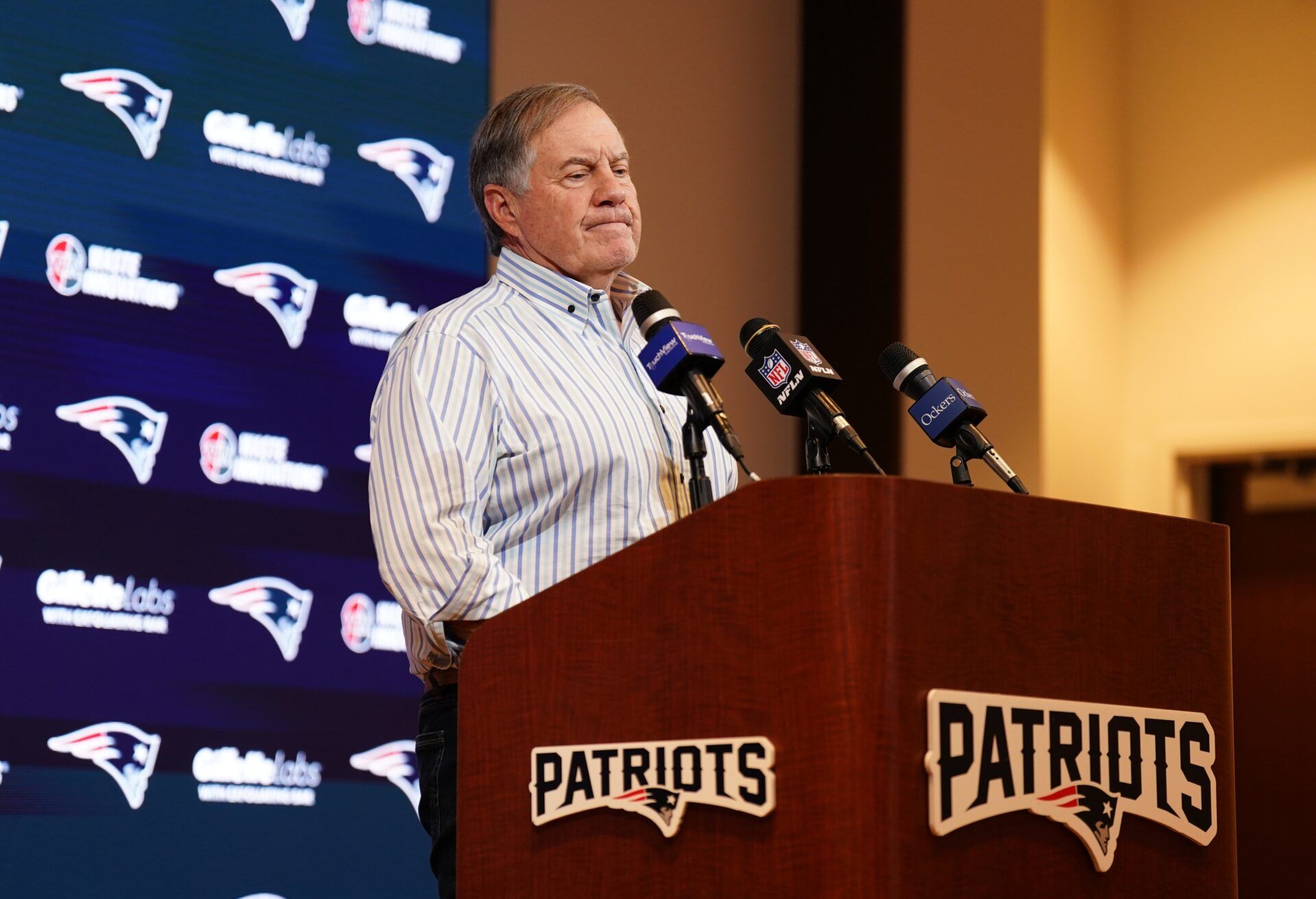 New England Patriots head coach Bill Belichick talks to reporters after the game against the New York Jets at Gillette Stadium.