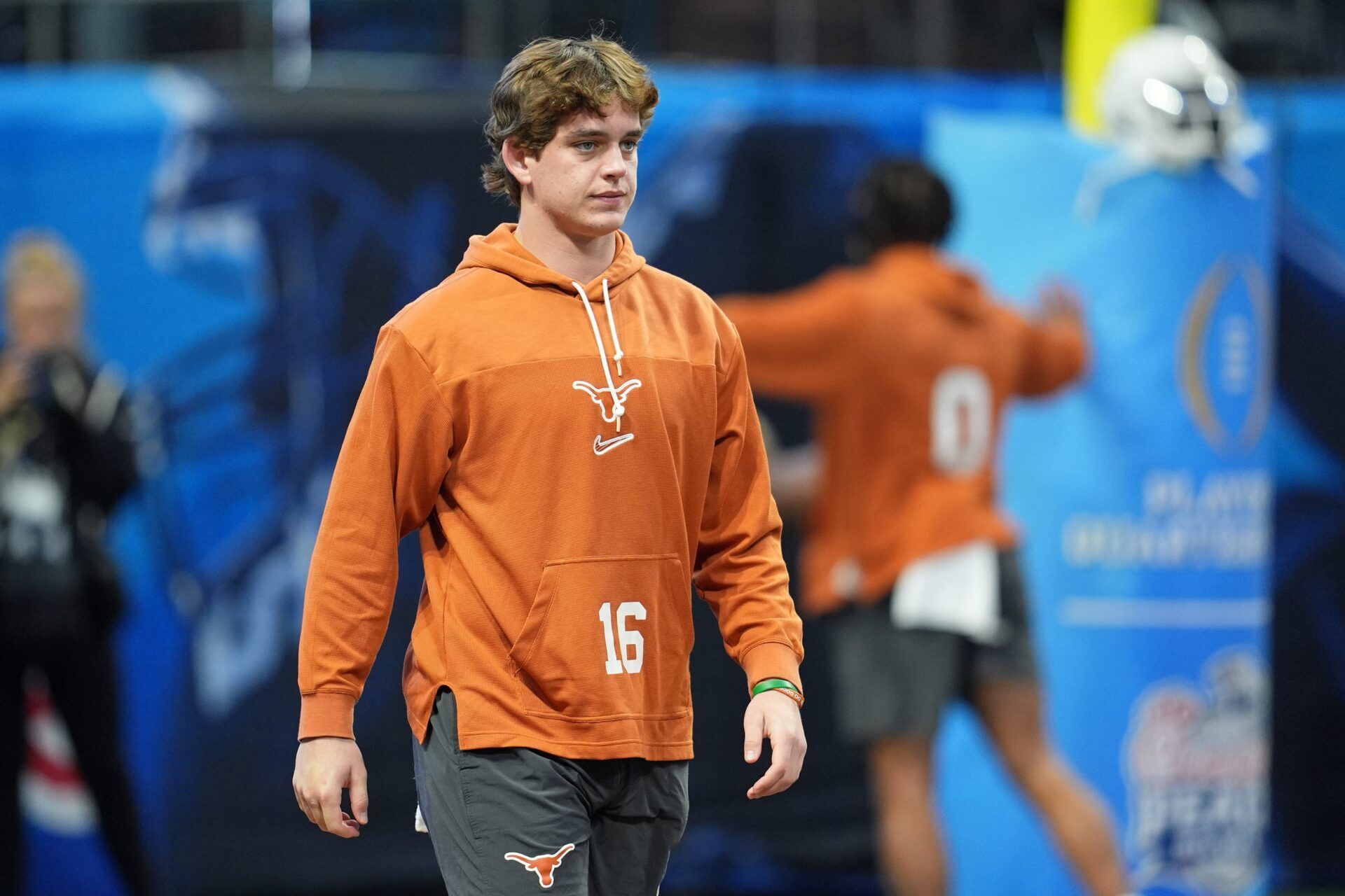 Texas Longhorns quarterback Arch Manning (16) warms up before the Peach Bowl at Mercedes-Benz Stadium.