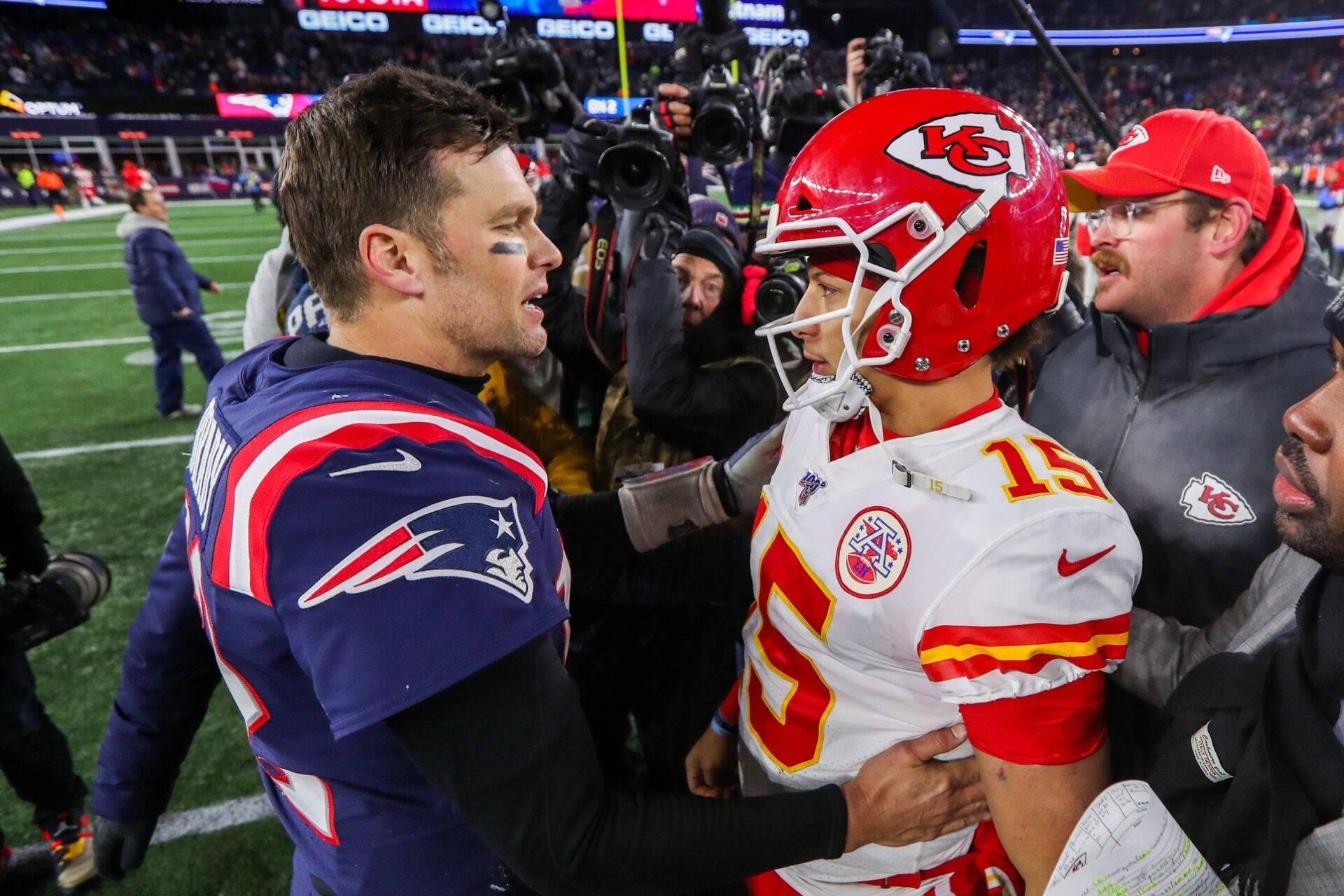 New England Patriots quarterback Tom Brady (12) and Kansas City Chiefs quarterback Patrick Mahomes (15) after the game at Gillette Stadium.