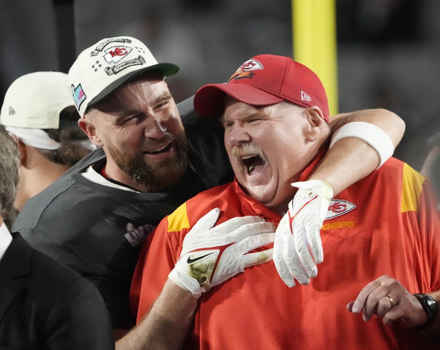 Andy Reid and Travis Kelce celebrate the Kansas City Chiefs' win over the Philadelphia Eagles in Super Bowl LVII at State Farm Stadium in Glendale, Arizona.