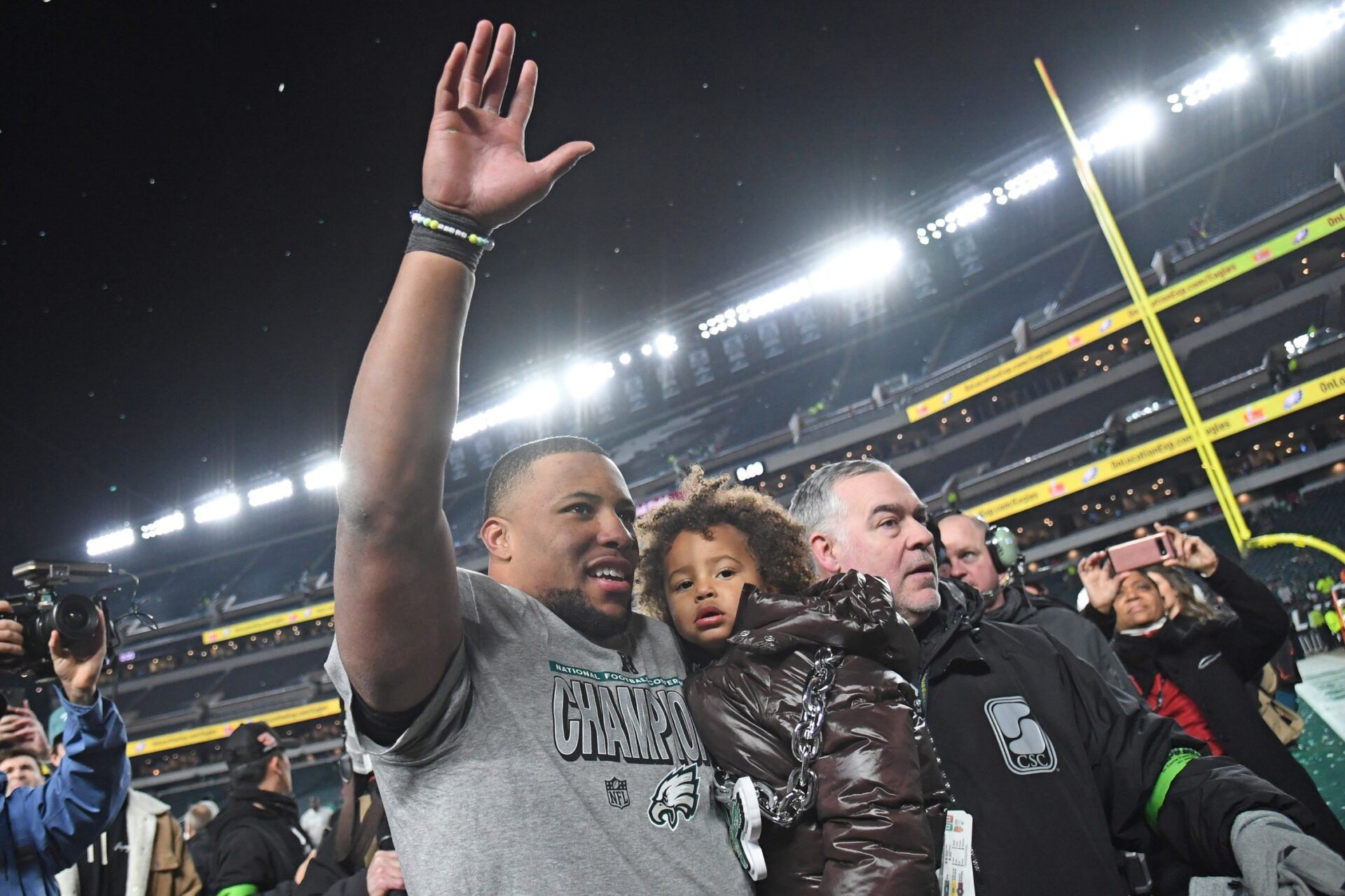 Philadelphia Eagles running back Saquon Barkley (26) walks off the field after win against the Washington Commanders in the NFC Championship game at Lincoln Financial Field.