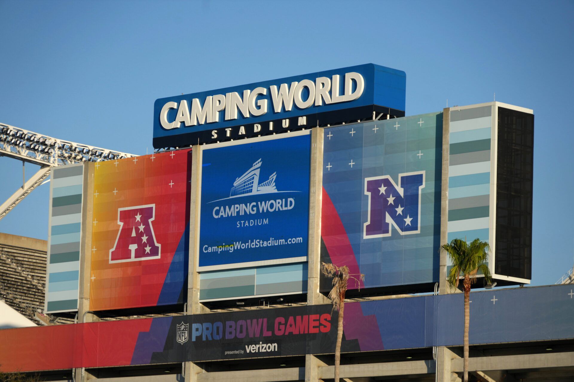 The AFC and NFC Conference logos on the Camping World Stadium video board.