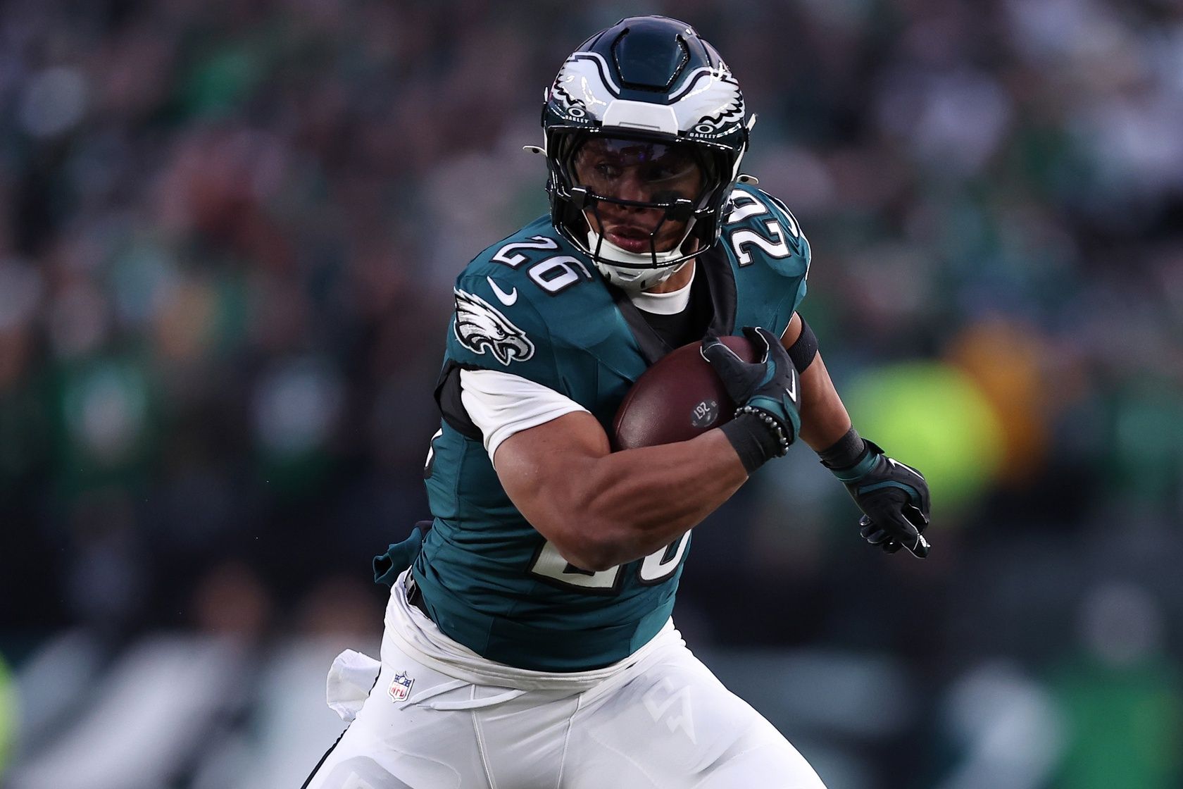 Philadelphia Eagles running back Saquon Barkley (26) rushes the ball against the Green Bay Packers during the first quarter in the NFC wild card game at Lincoln Financial Field.