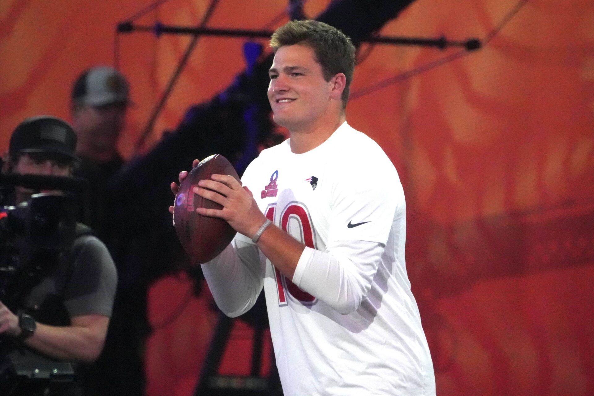 AFC quarterback Drake Maye (10) throws the ball during the Passing the Test event at the Pro Bowl Skills Challenge at Nicholson Fieldhouse.