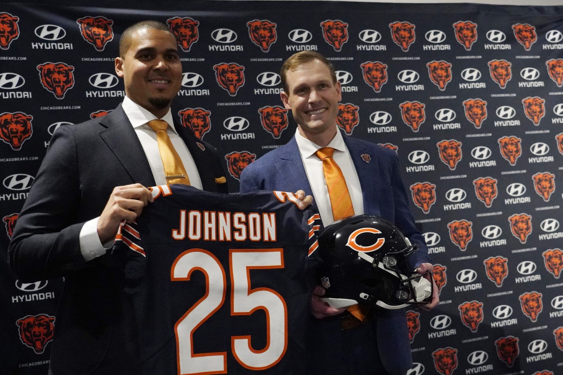 Chicago Bears new head coach Ben Johnson (right) with general manager Ryan Poles pose for photos after a press conference introducing him at PNC Center.