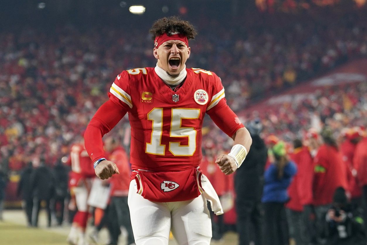 Kansas City Chiefs quarterback Patrick Mahomes (15) reacts before the AFC Championship game against the Buffalo Bills at GEHA Field at Arrowhead Stadium.