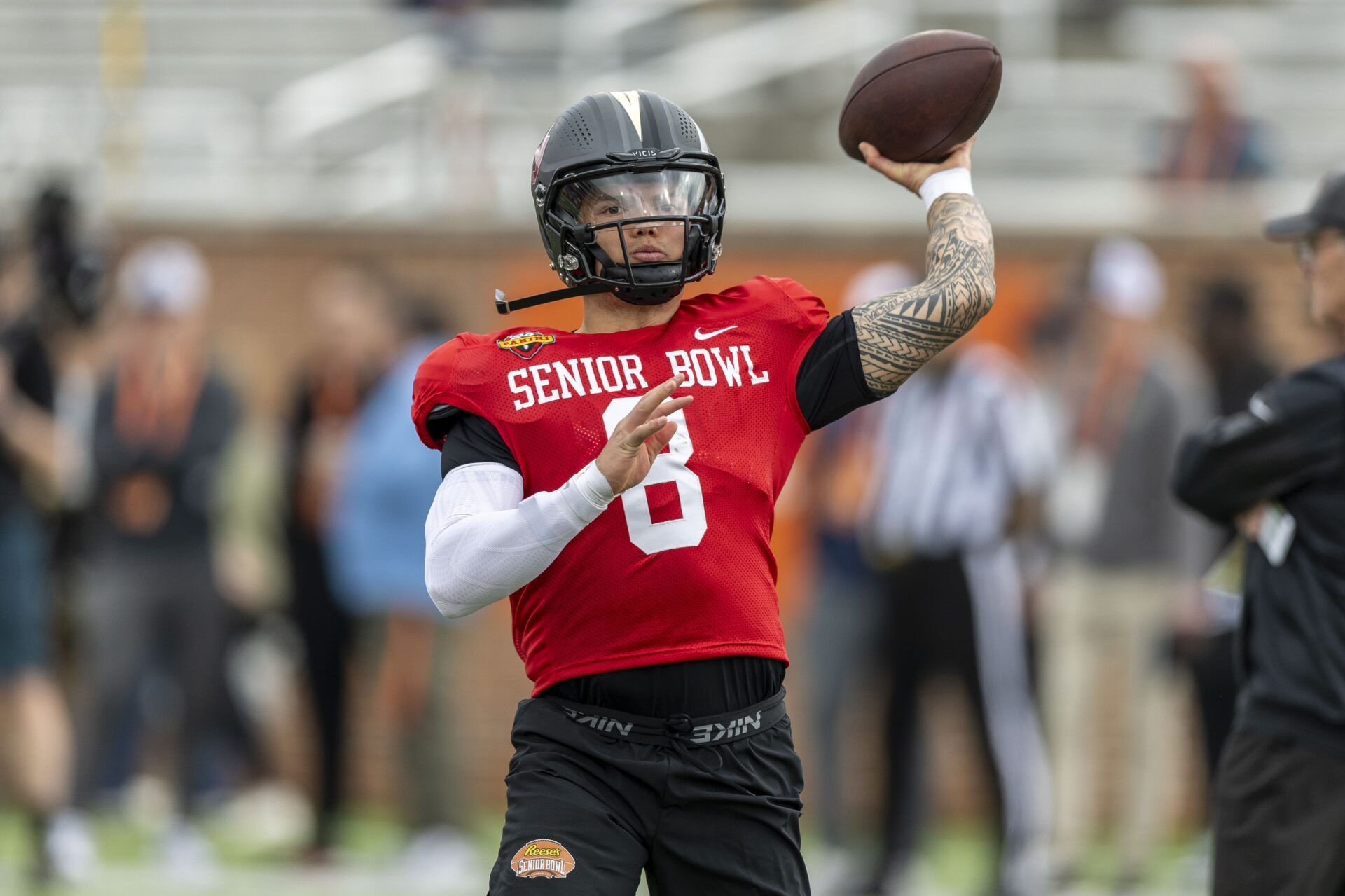 National team quarterback Dillon Gabriel of Oregon (8) works through drills during Senior Bowl practice for the National team at Hancock Whitney Stadium.