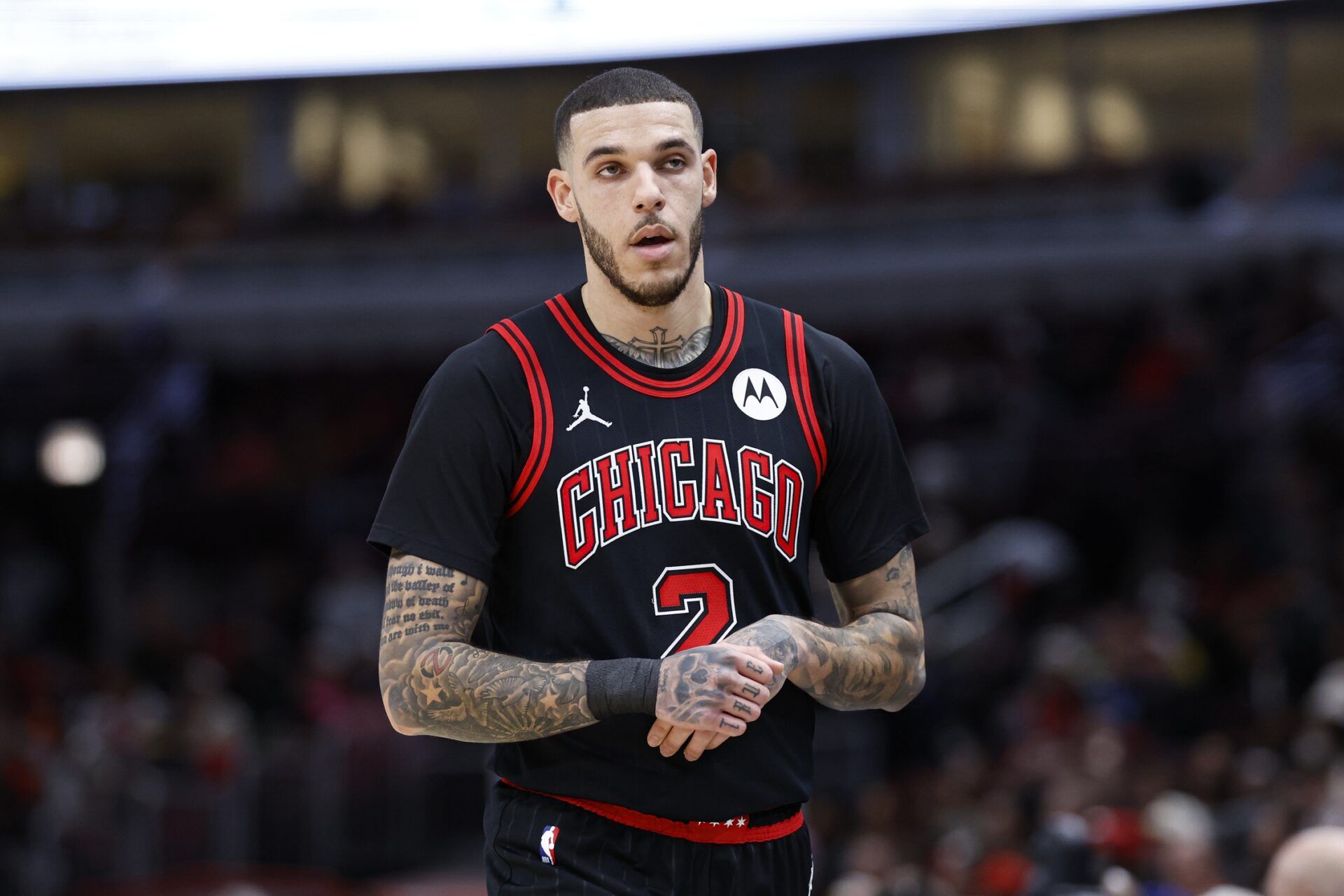 Chicago Bulls guard Lonzo Ball (2) walks back to the bench during the first half at United Center.