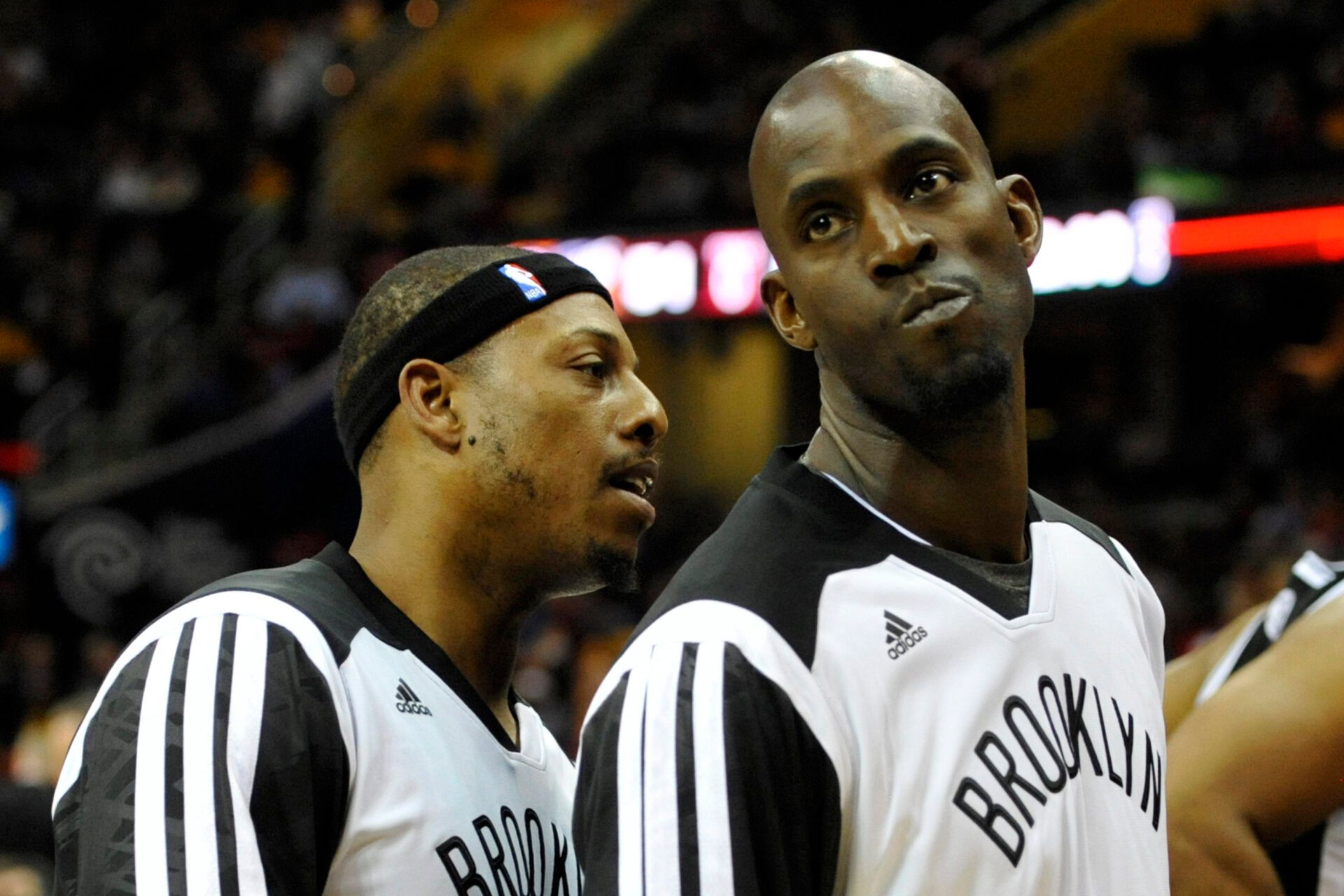 Apr 12, 2014; Cleveland, OH, USA; Brooklyn Nets forward Paul Pierce (left) talks to center Kevin Garnett (2) at halftime of a game against the Cleveland Cavaliers at Quicken Loans Arena. Mandatory Credit: David Richard-USA TODAY Sports