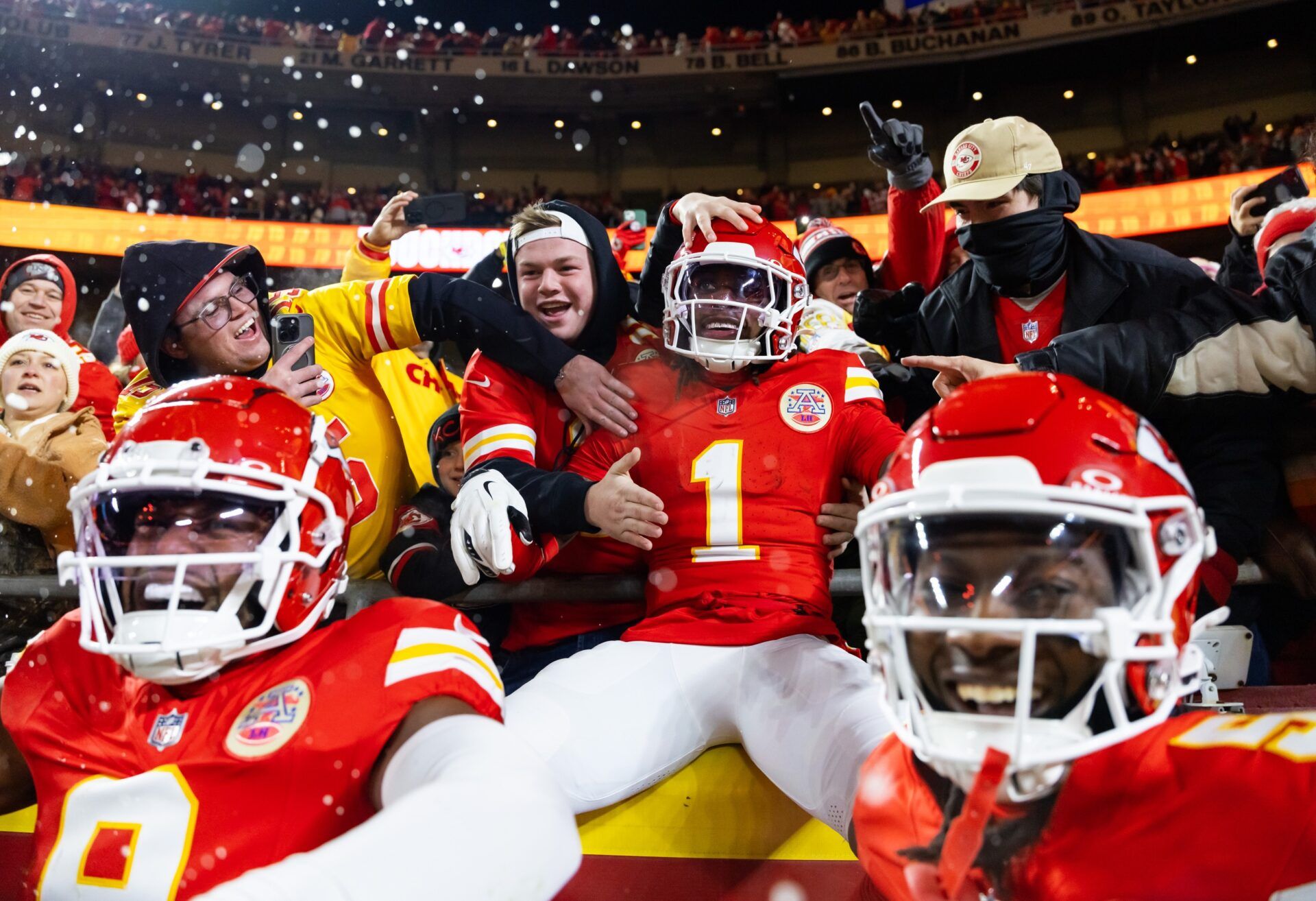 Kansas City Chiefs wide receiver Xavier Worthy (1) celebrate with fans after a touchdown against the Buffalo Bills during the first half in the AFC Championship game at GEHA Field at Arrowhead Stadium.