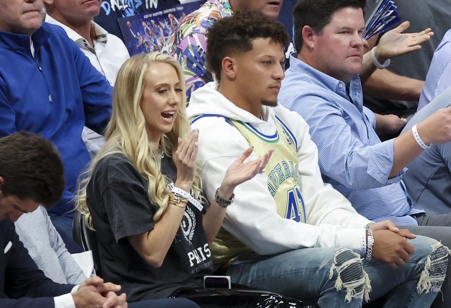 Kansas City Chiefs quarterback Patrick Mahomes and wife Brittany watch the game between the Dallas Mavericks and Golden State Warriors during the second quarter in game three of the 2022 Western Conference finals at American Airlines Center.