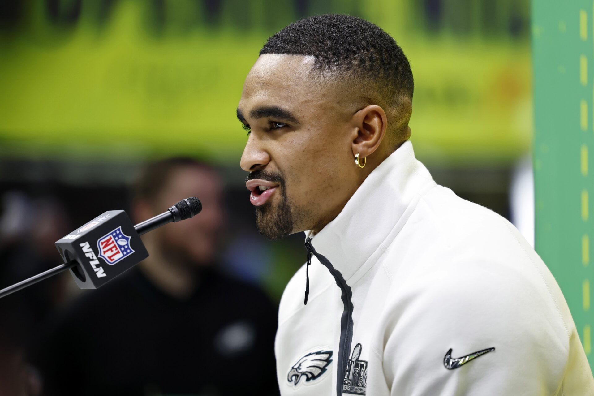 Philadelphia Eagles quarterback Jalen Hurts (1) talks to the media during Super Bowl LIX Opening Night at Ceasars Superdome.